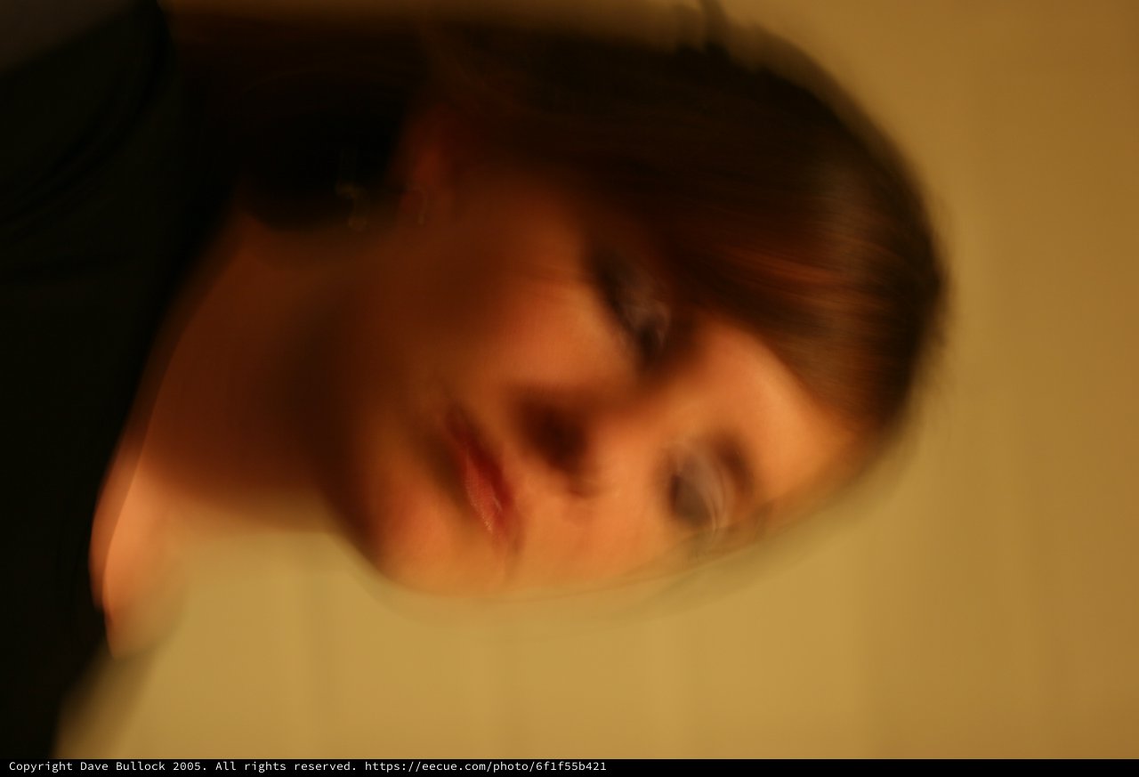 Motion Blur Portrait of Woman with Closed Eyes