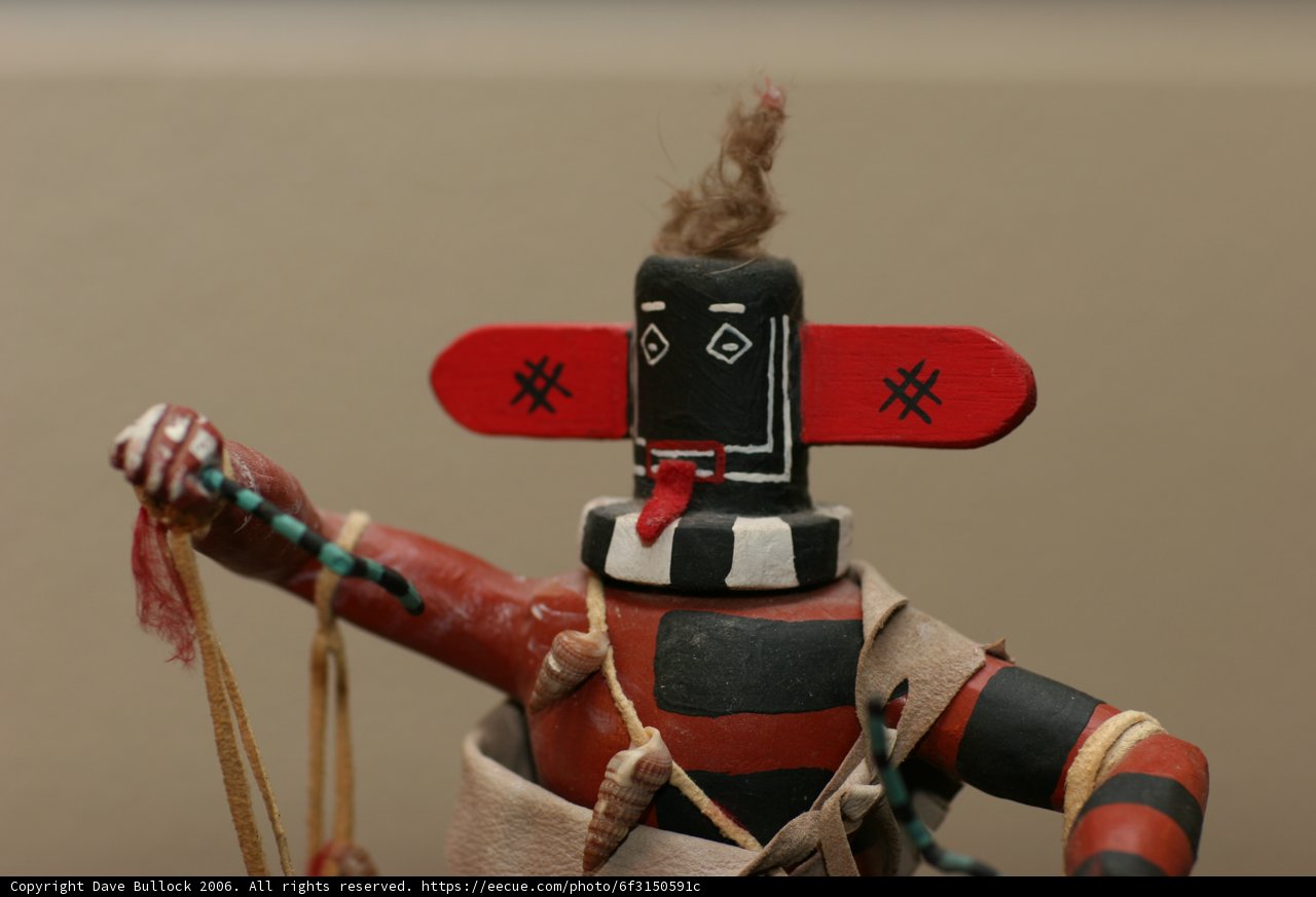 Tiny Native American Doll with a Red Hat