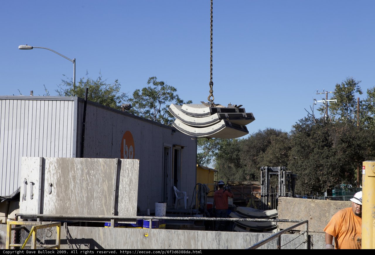 Crane Lifting Furniture From Building