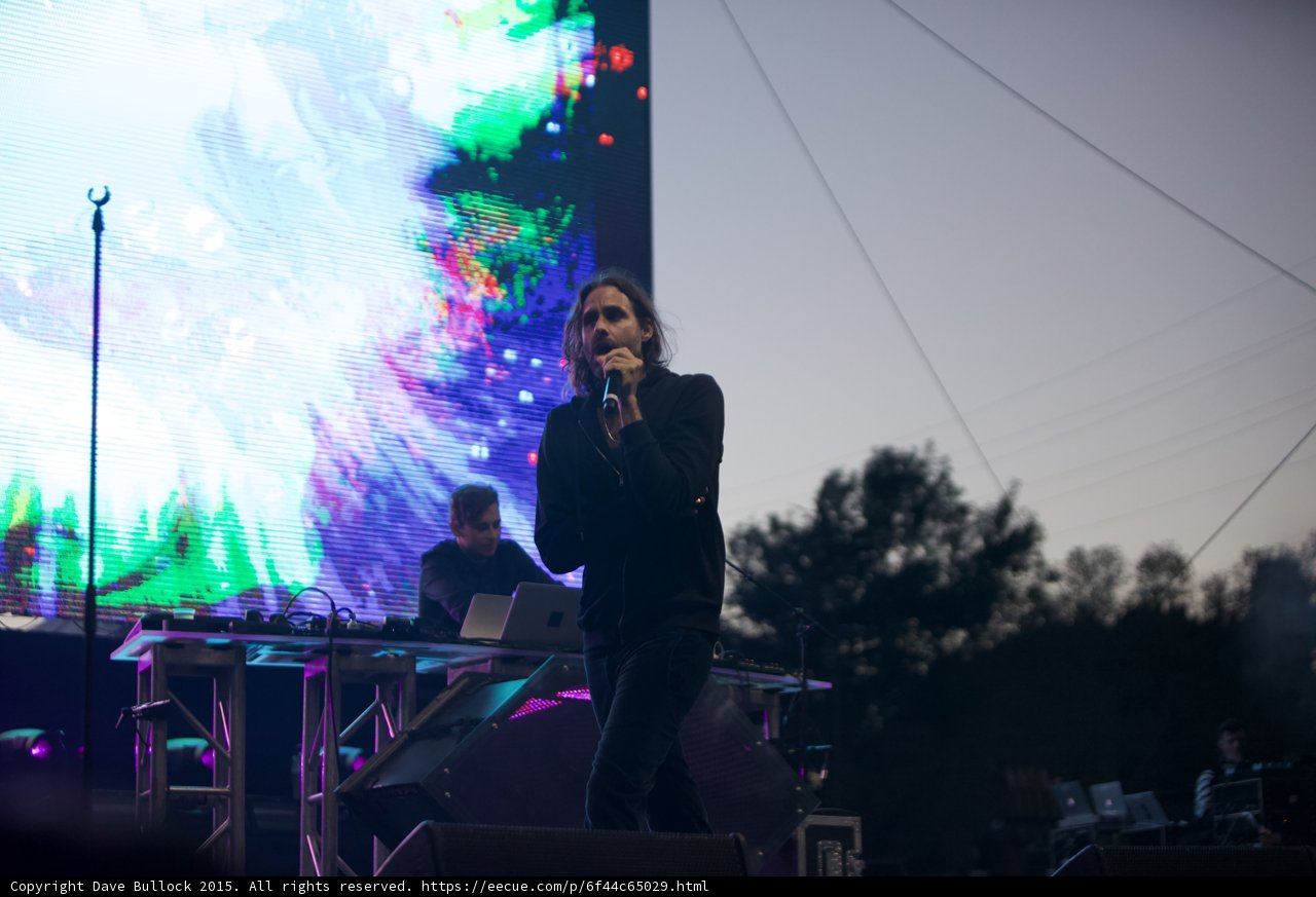 Performer Singing Colorful Backdrop