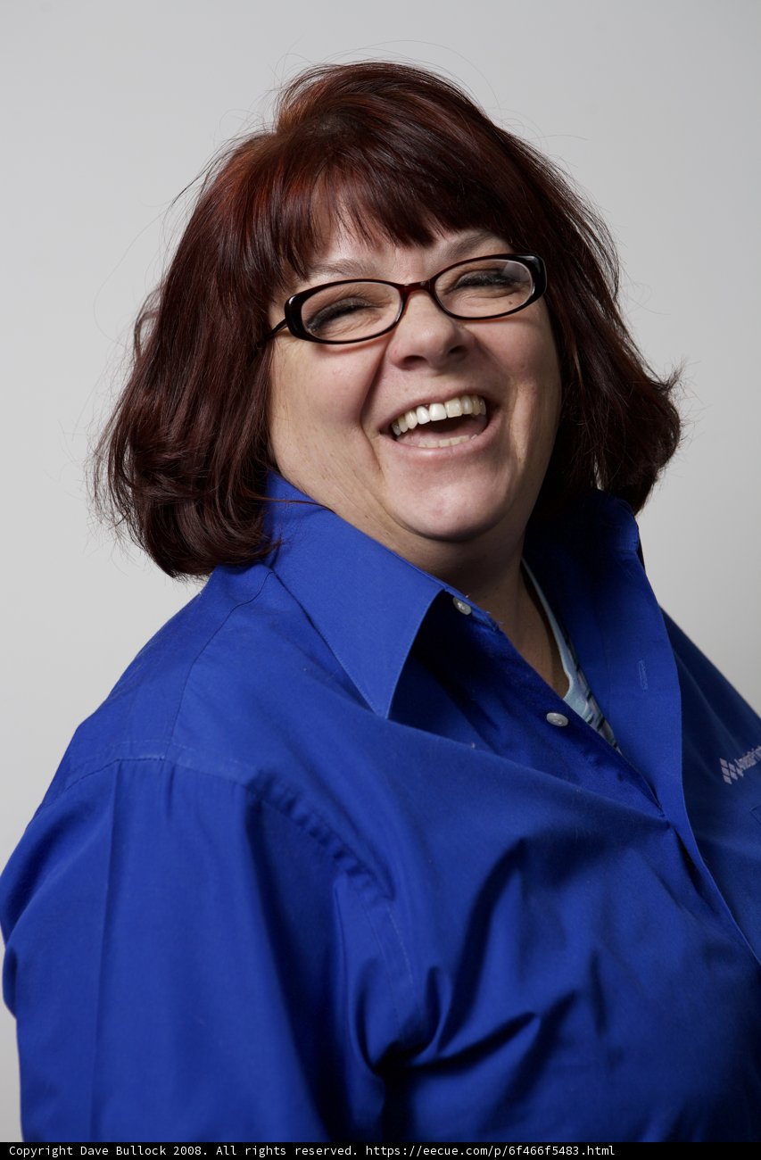 Happy Woman in Blue Glasses