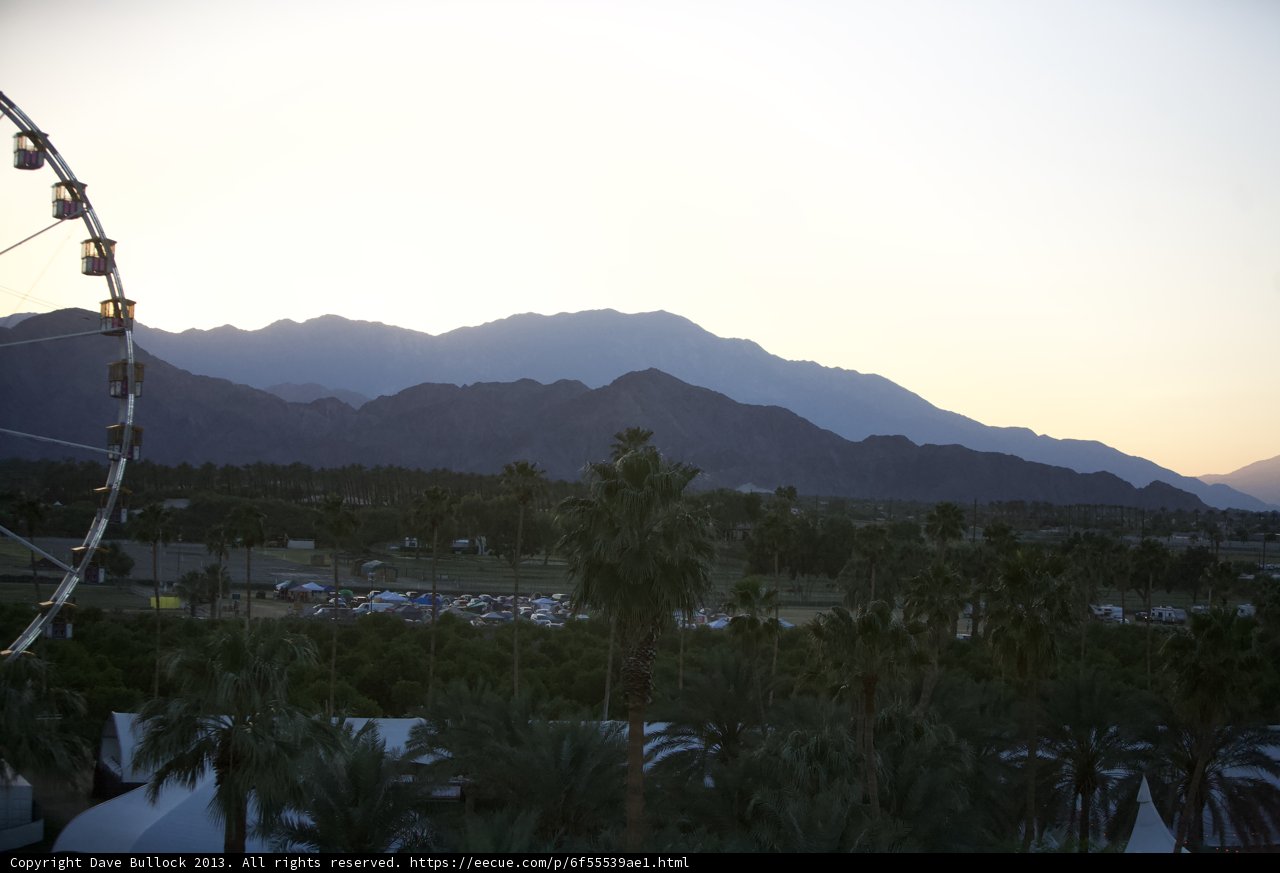 Ferris Wheel against Mountains