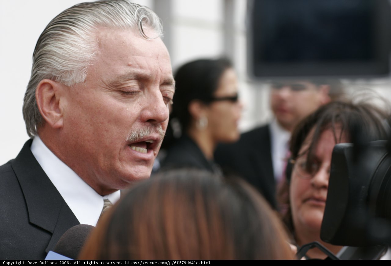 Man with Mustache Addresses Reporters During School Walkout