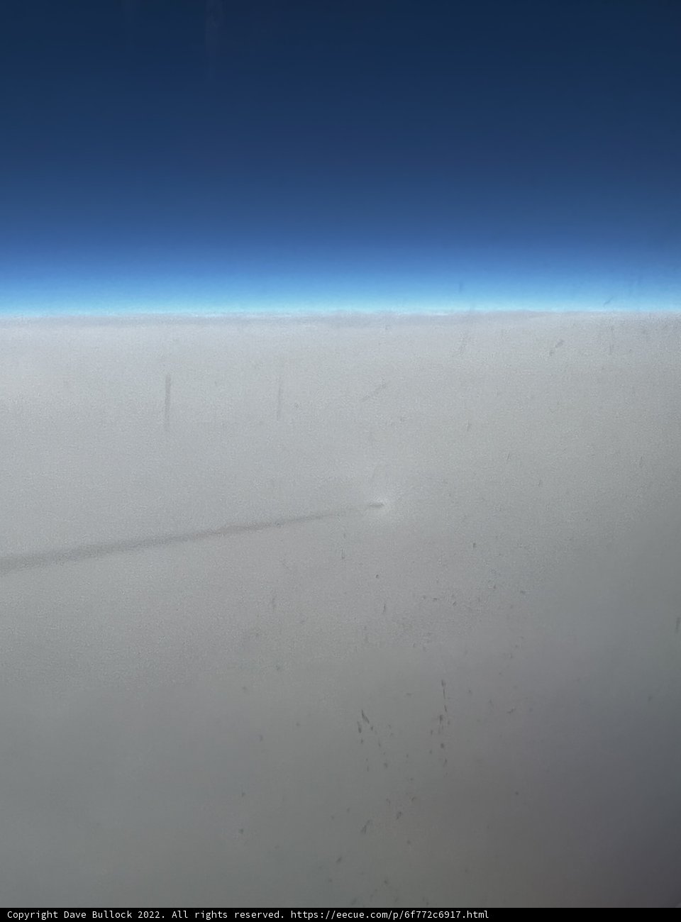 Flying High Above the Azure Sky