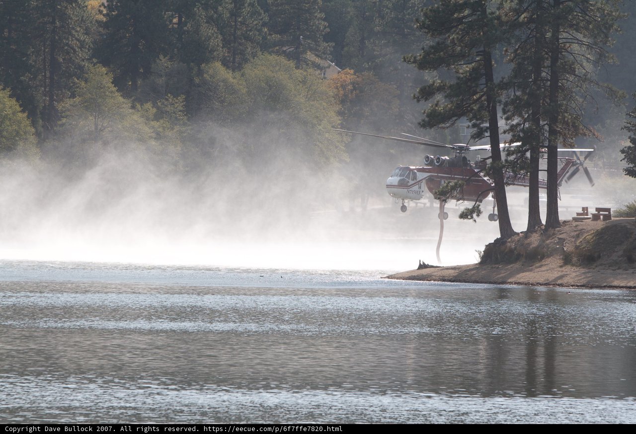 Helicopter Spraying Water on Lake during 2007 Fire