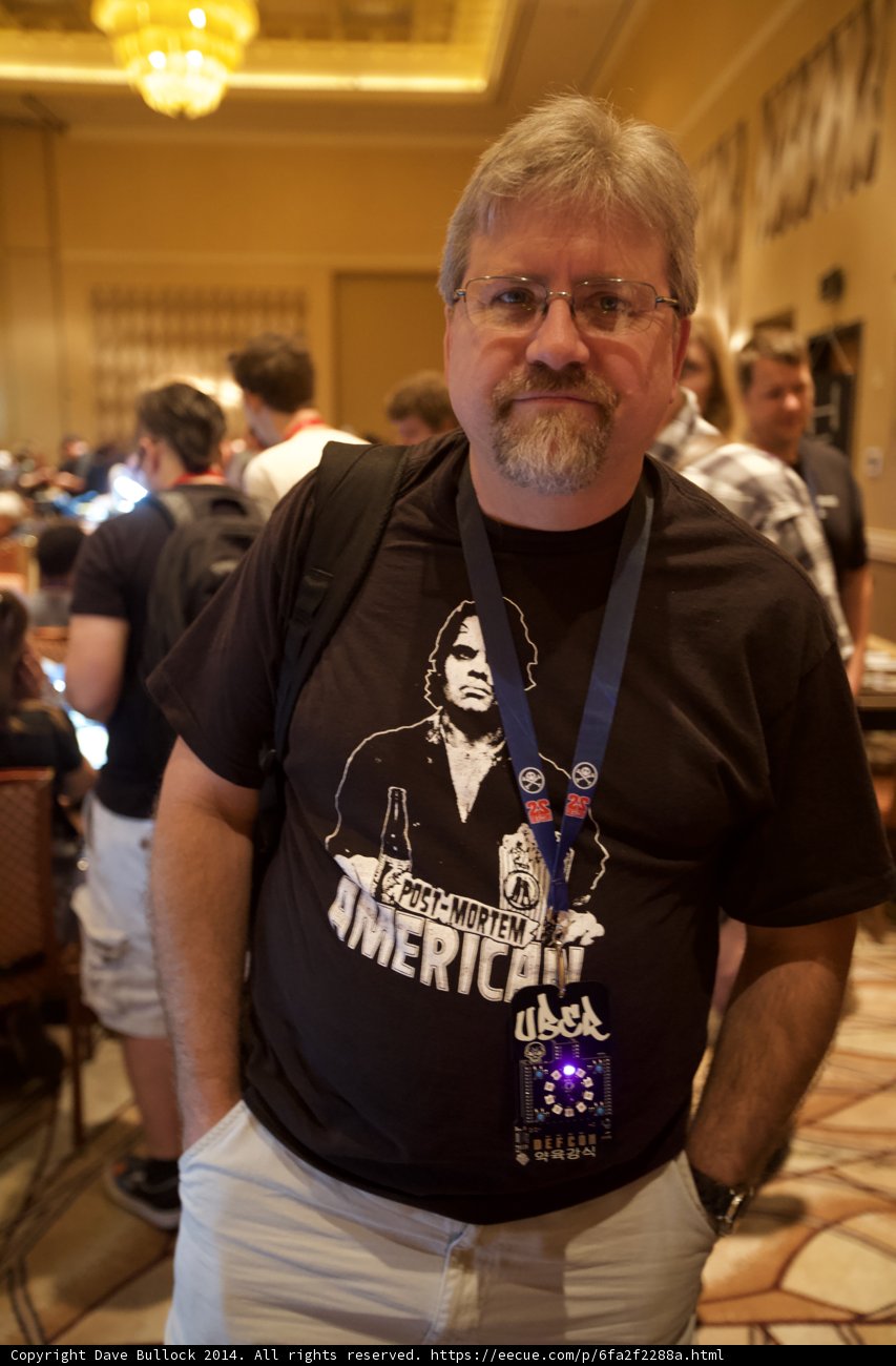 Medal-Wearing Man in Black Shirt