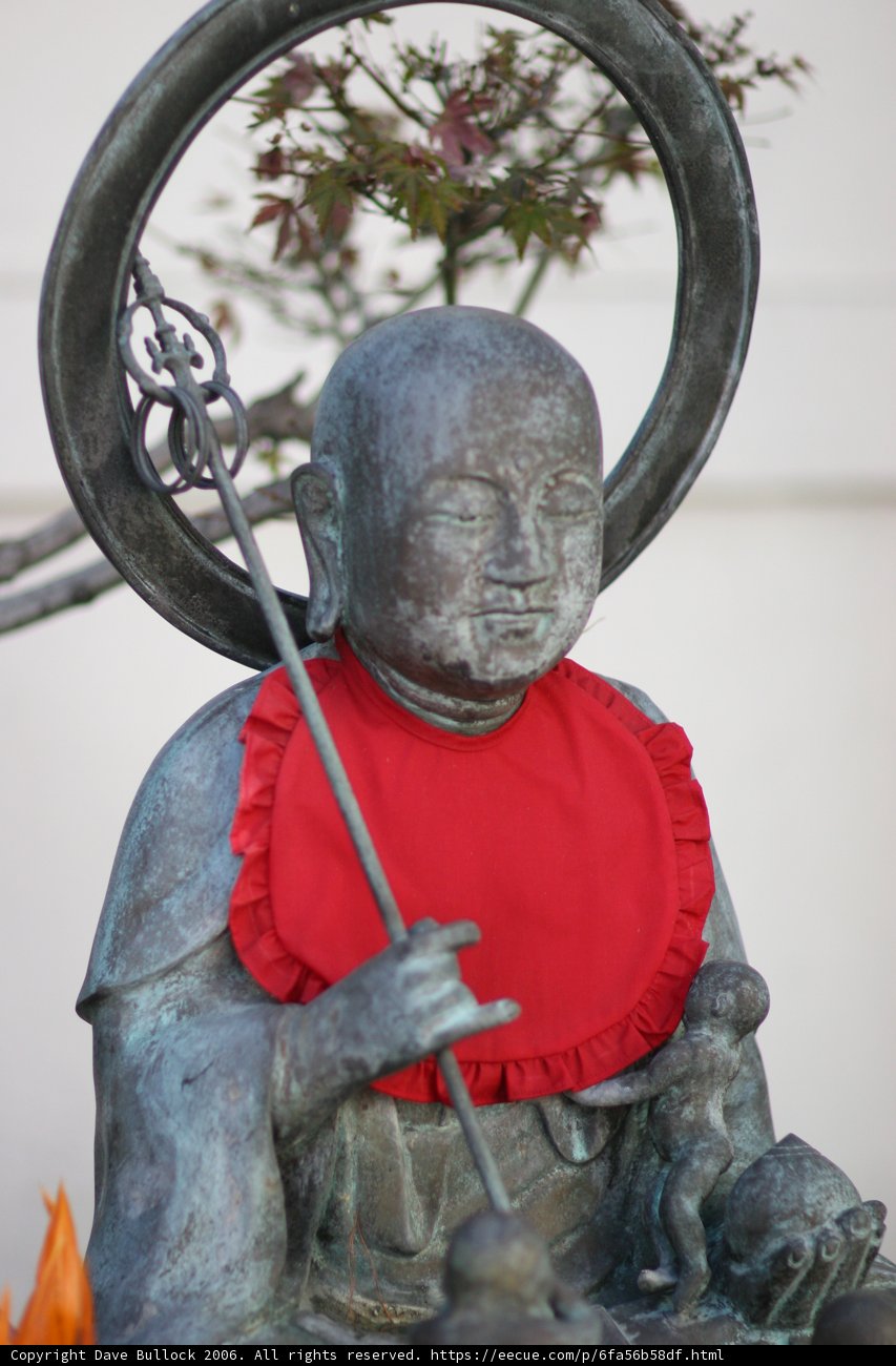 Serene Buddha with Red Scarf