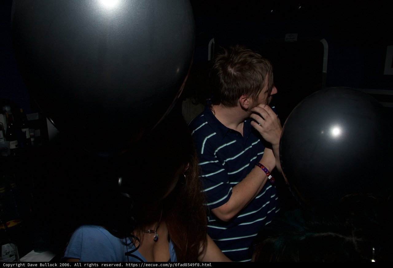 Black Balloon in the Urban Night