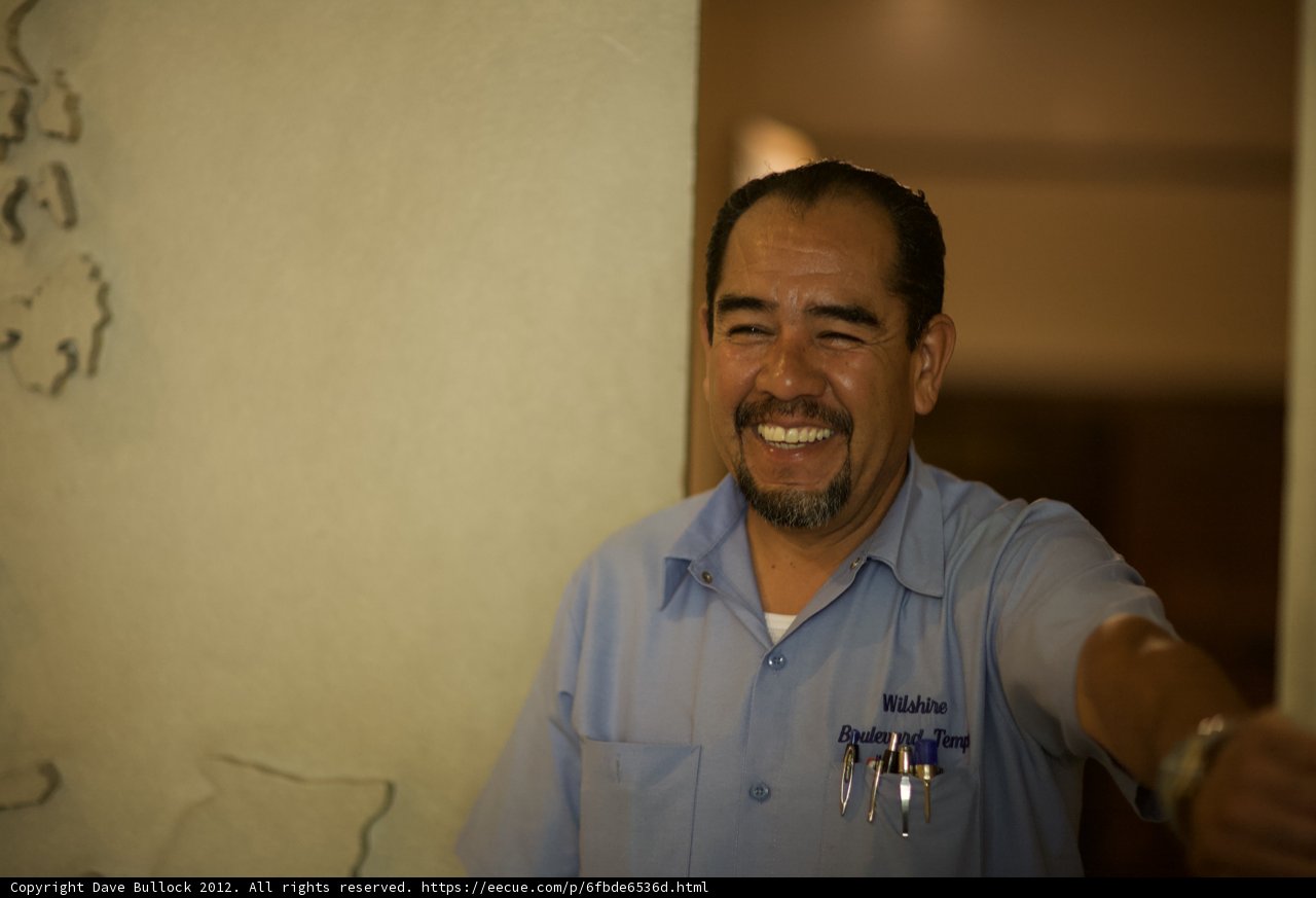 Happy Man in Blue Shirt