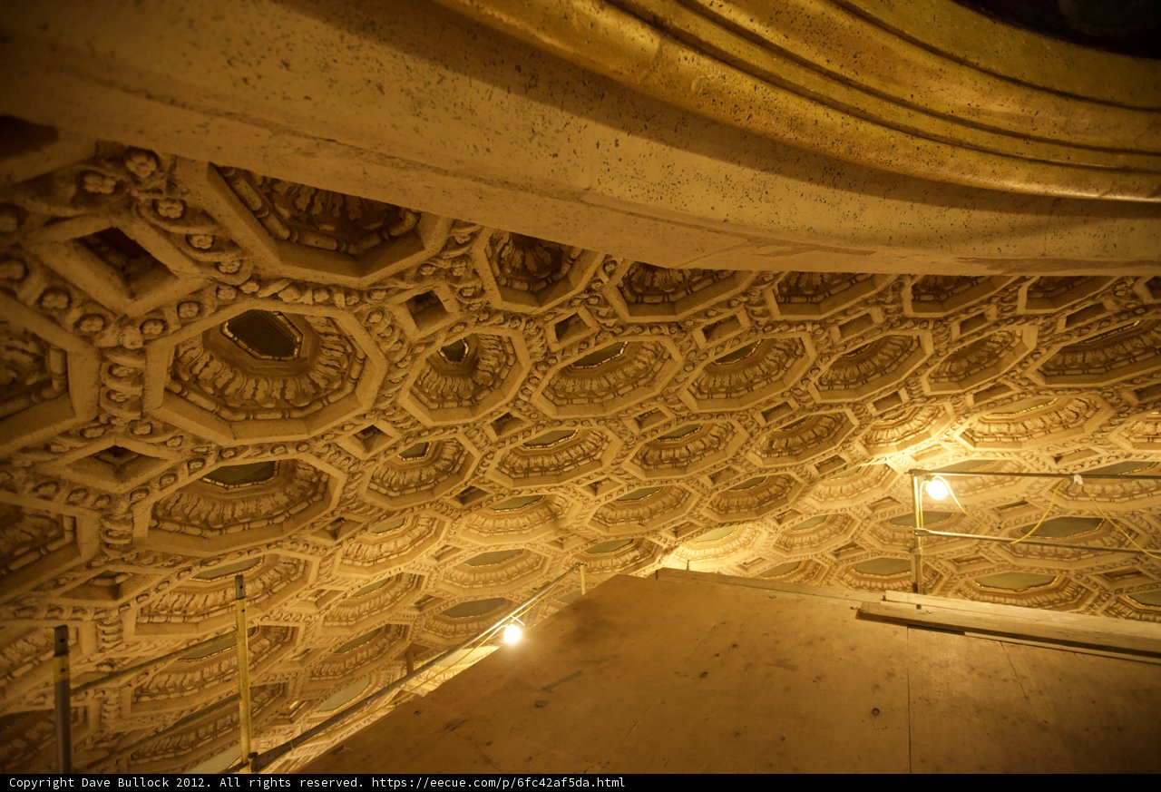 Intricate Designs on Theater Ceiling