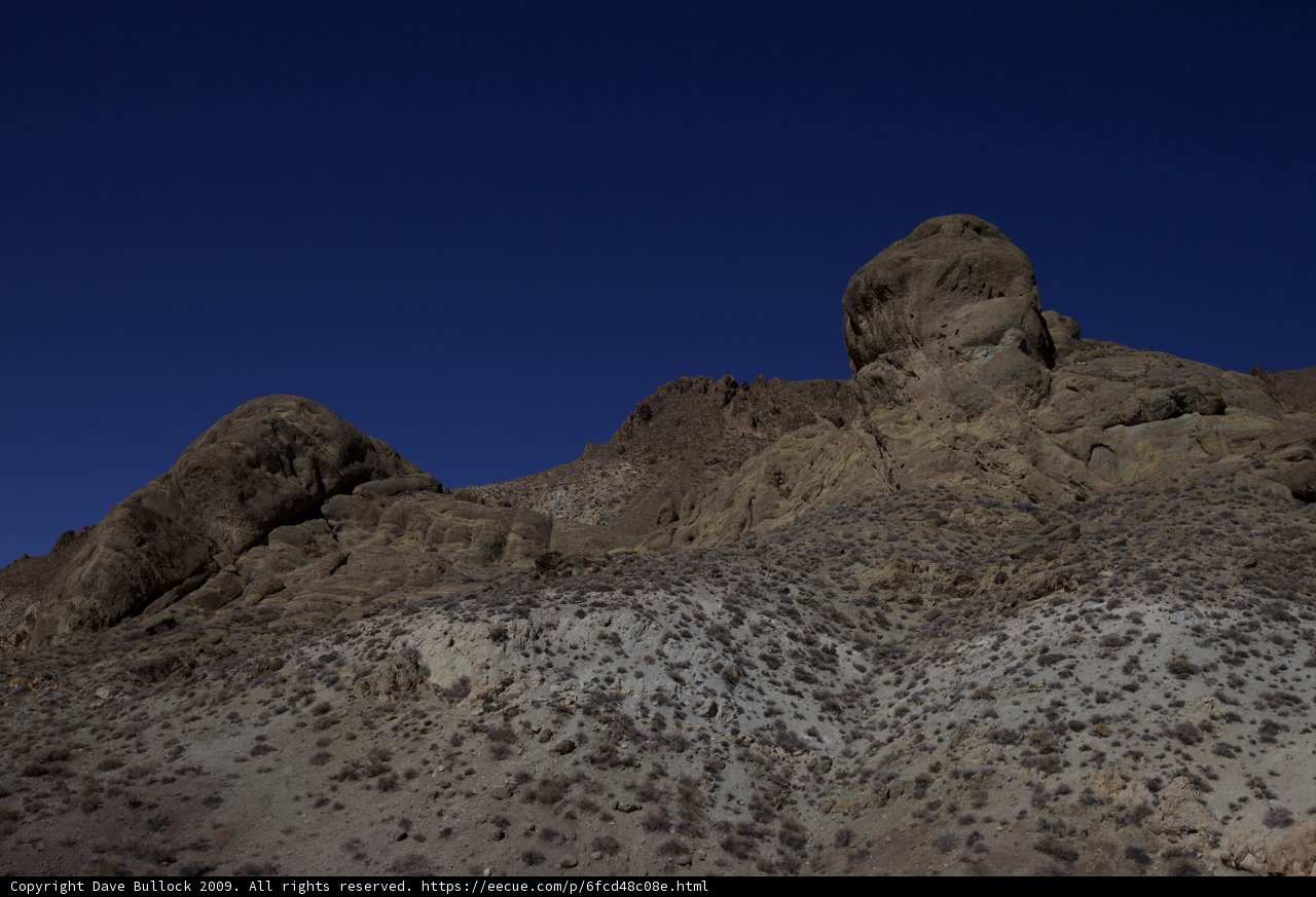 Towering Rocks in the Vast Desert Plateau