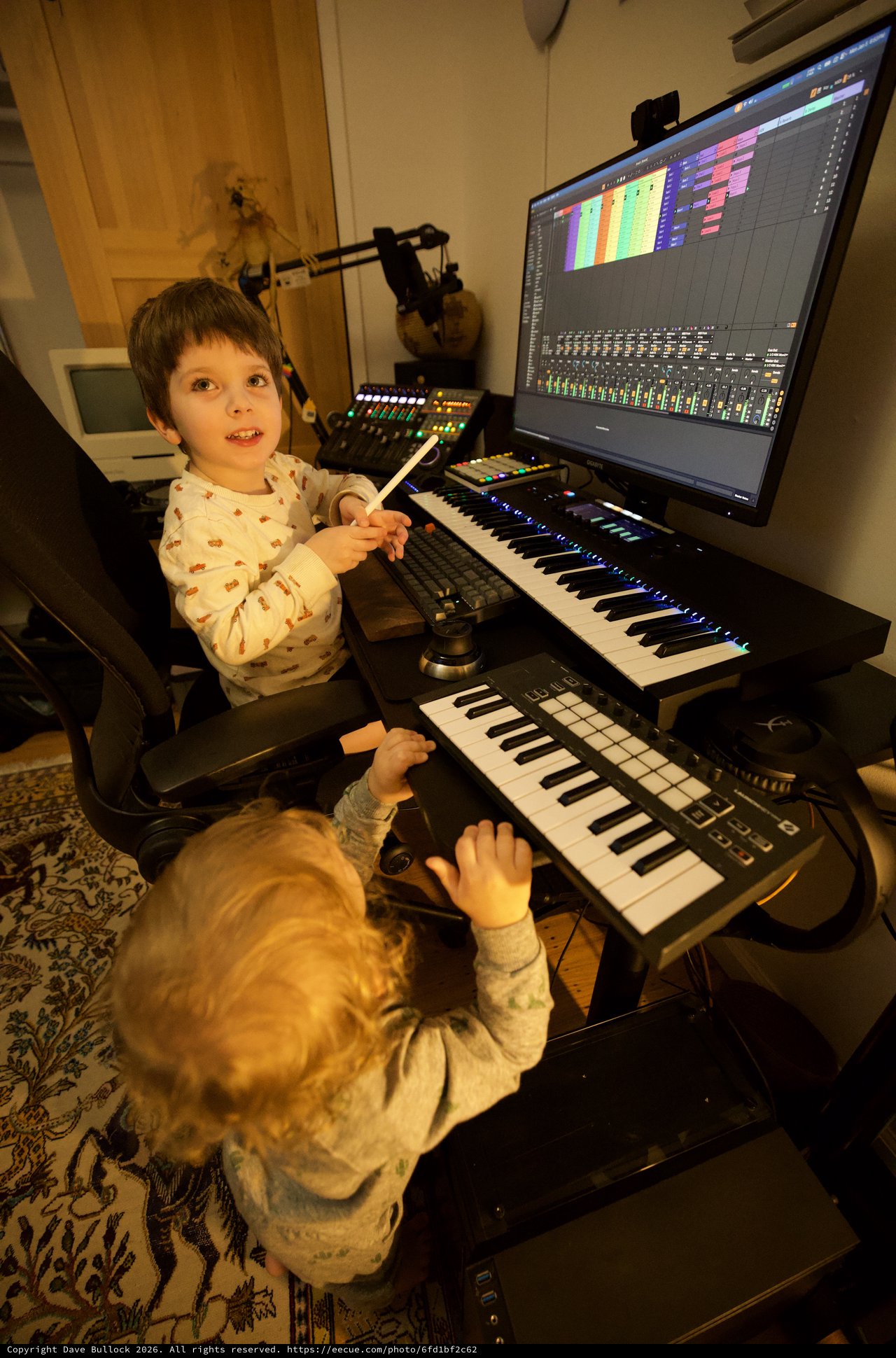 Young Children Learning Music Production at Home Studio