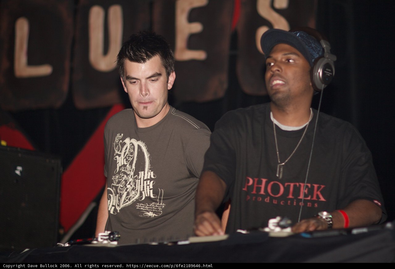 Two Men Showcasing Their Turntable Skills