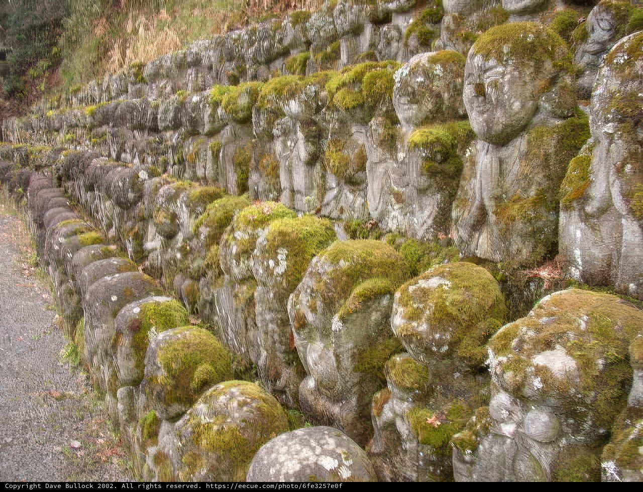 Moss-Covered Stone Statues