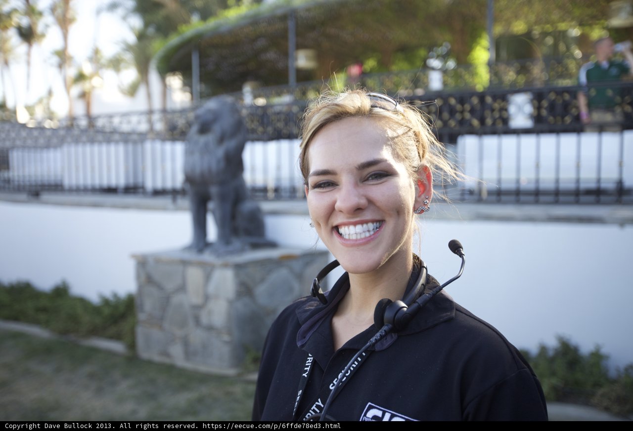Smiling Woman with Headphones enjoying Coachella