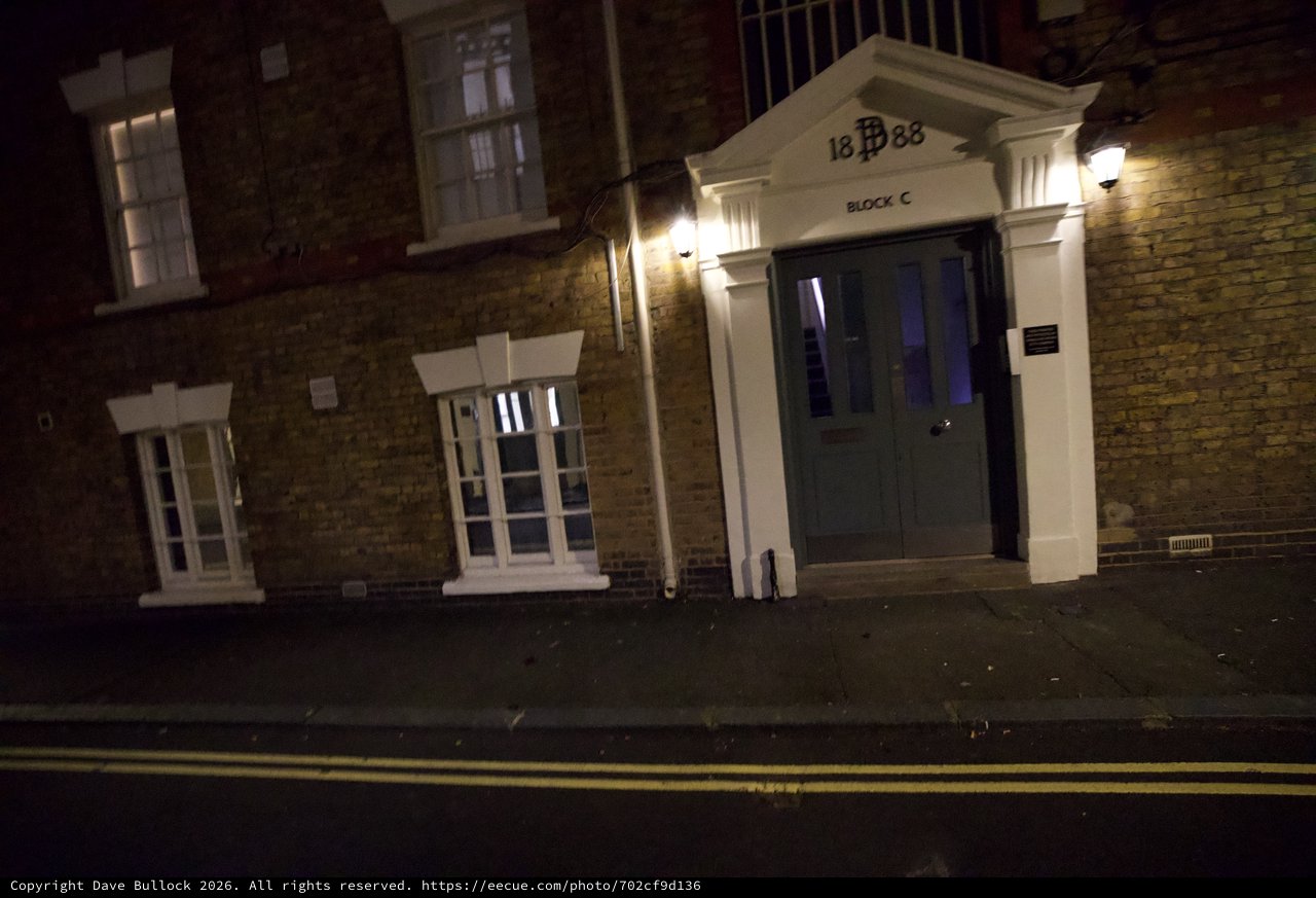 Historic London Building Entrance at Night - Block C 1888