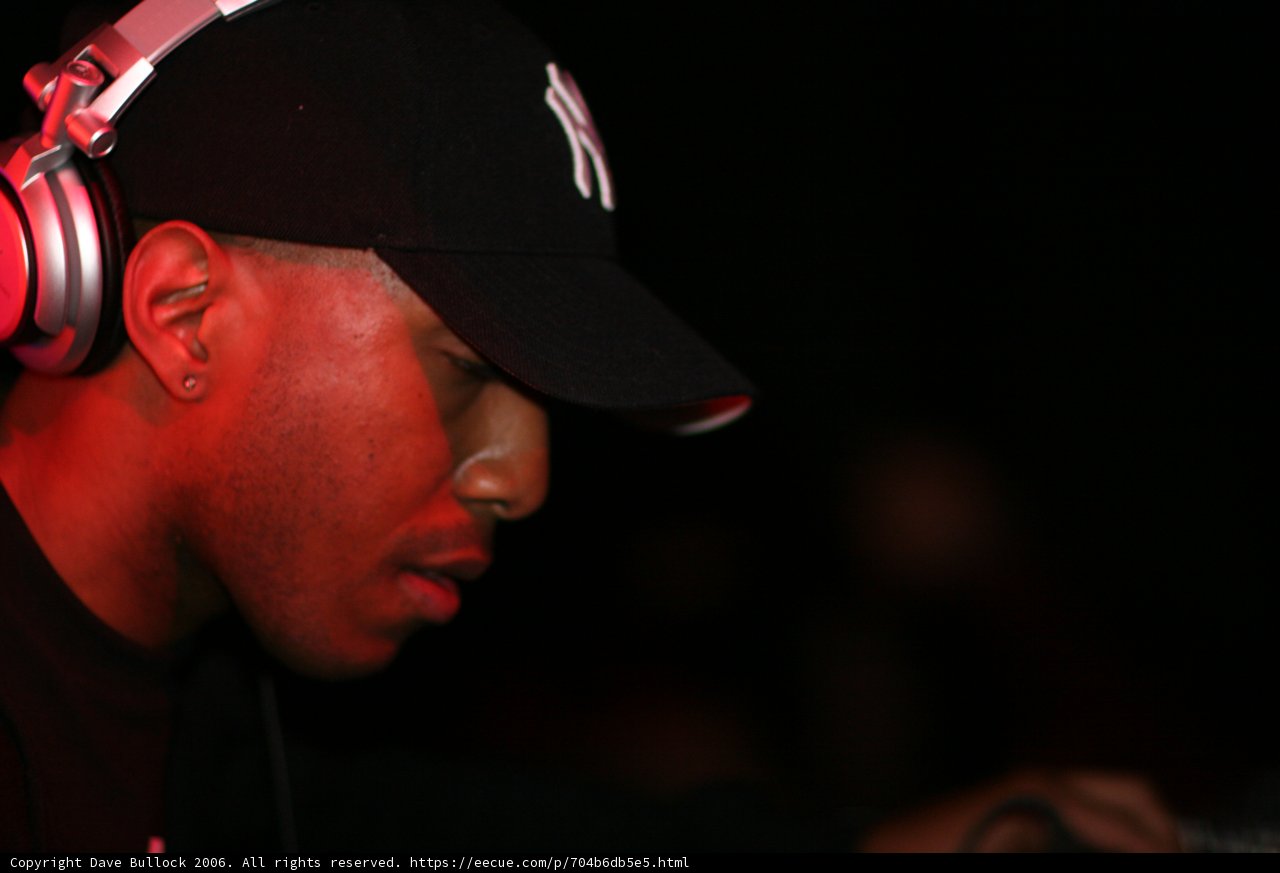 Grooving with Headphones and Baseball Cap
