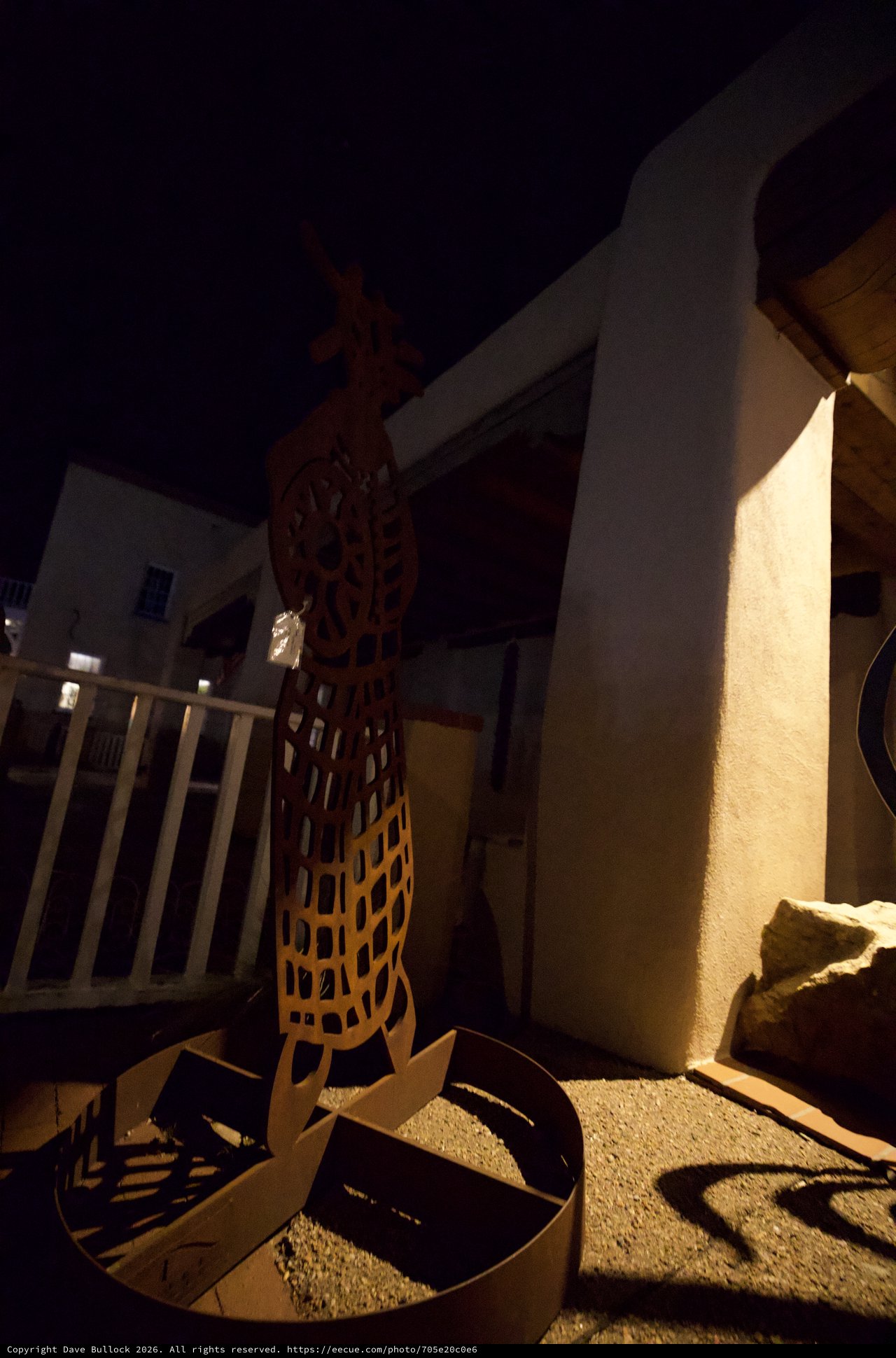 Illuminated Sculptural Art Installation at Night Courtyard