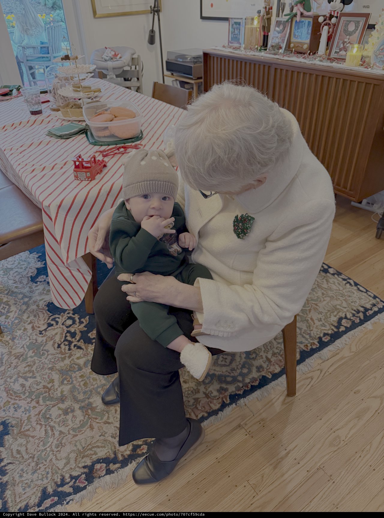 Grandmother's Tender Moment with Baby Grandchild