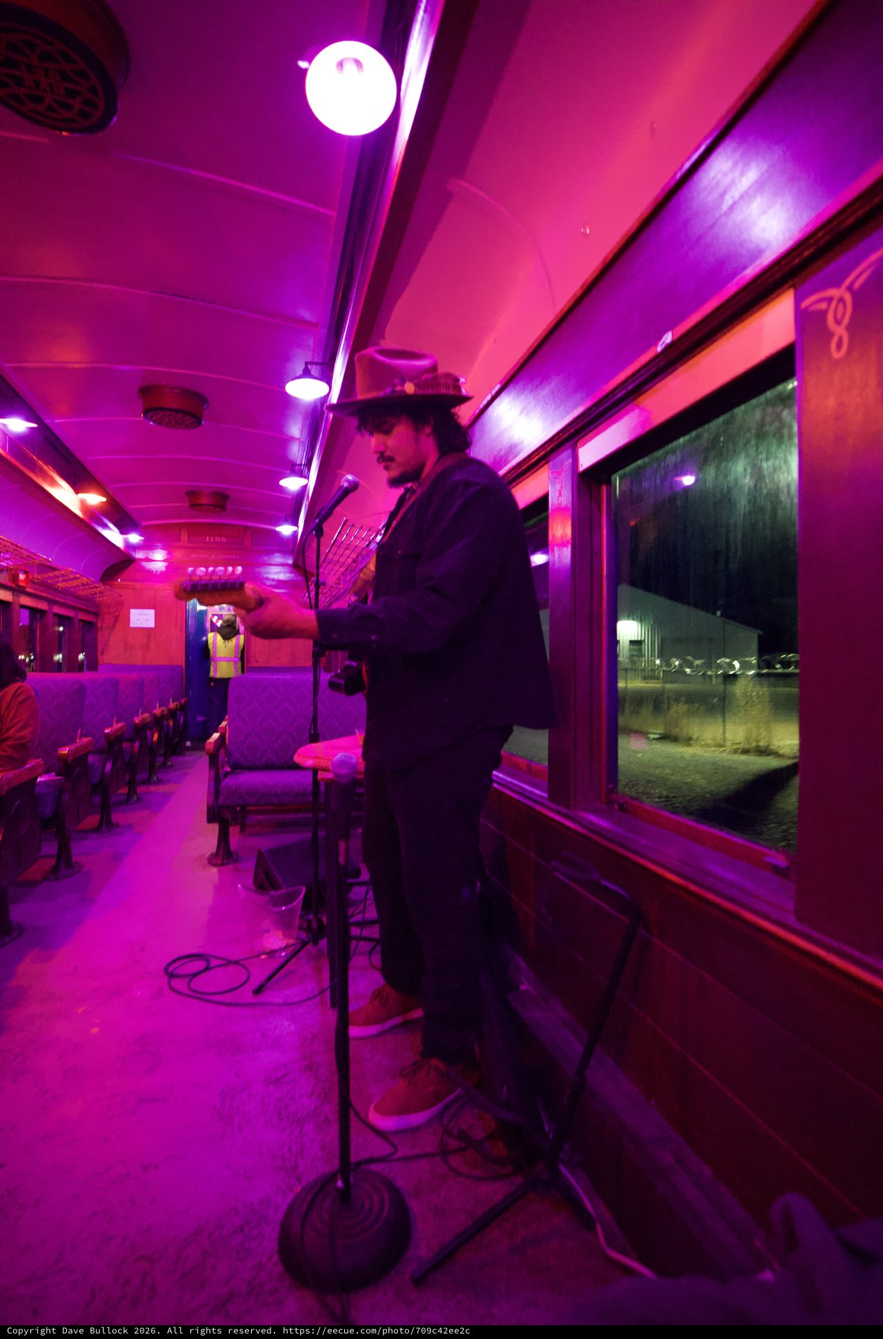 Late Night Diner Car with Vibrant Pink Lighting