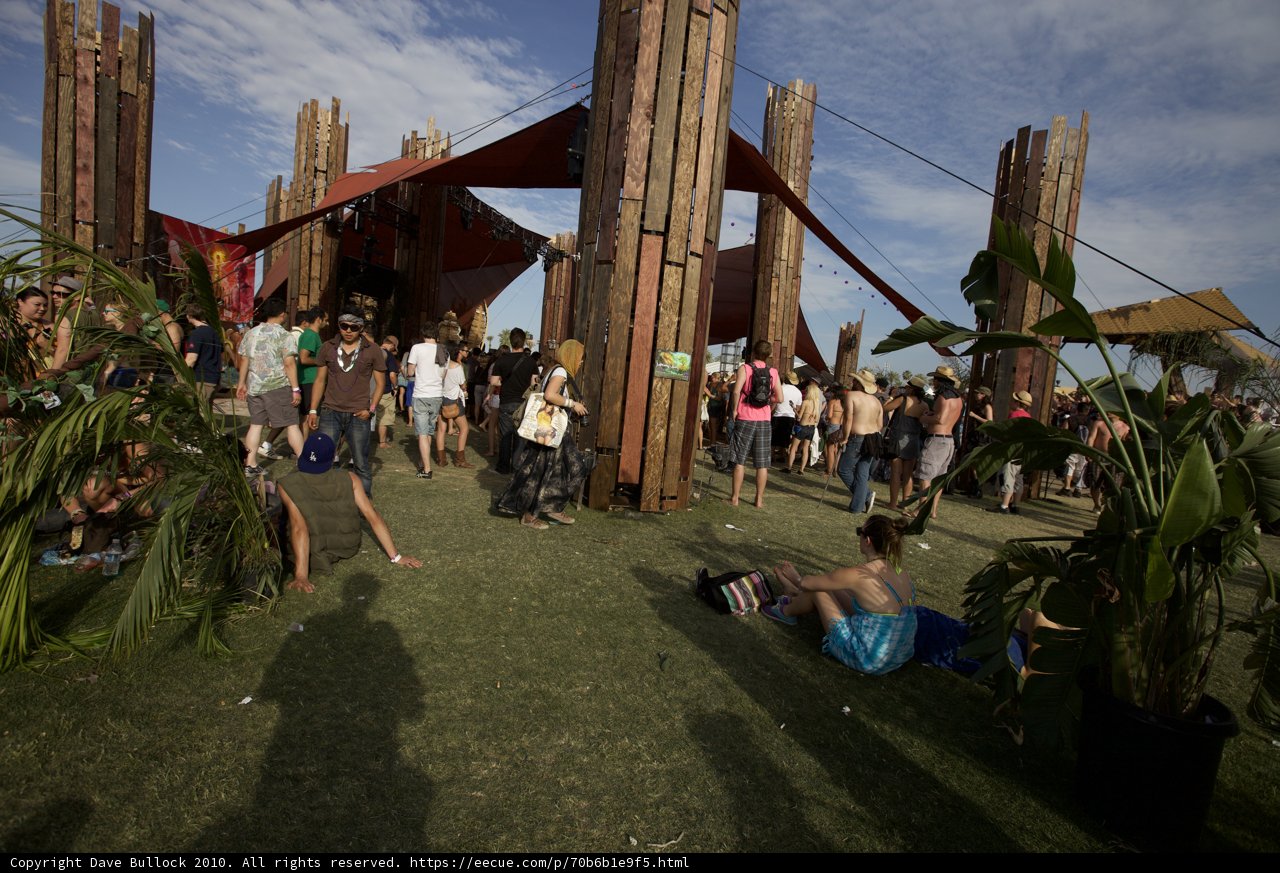 Relaxing on the Grass near the Wooden Hut