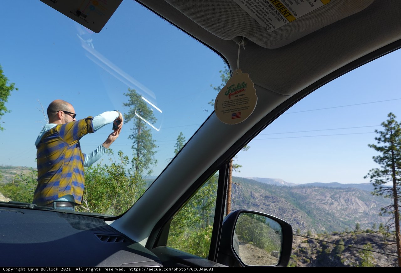 Mountain Road Photography Session Through Windshield View