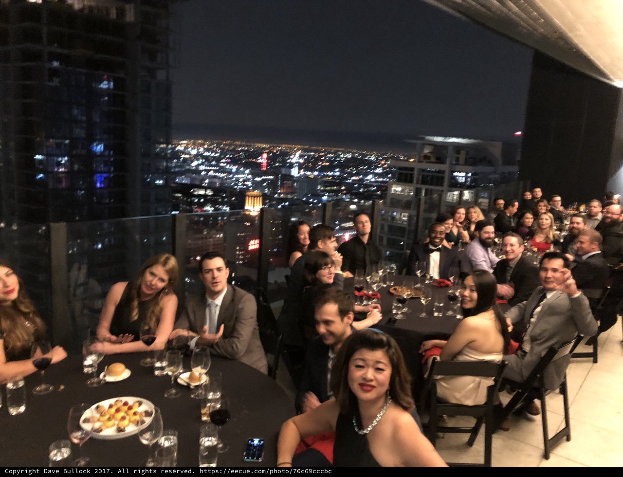Elegant Rooftop Gala Dinner with City Skyline