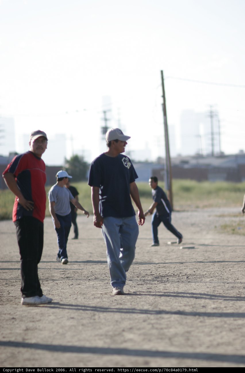 Playing Ball on the Dirt Field