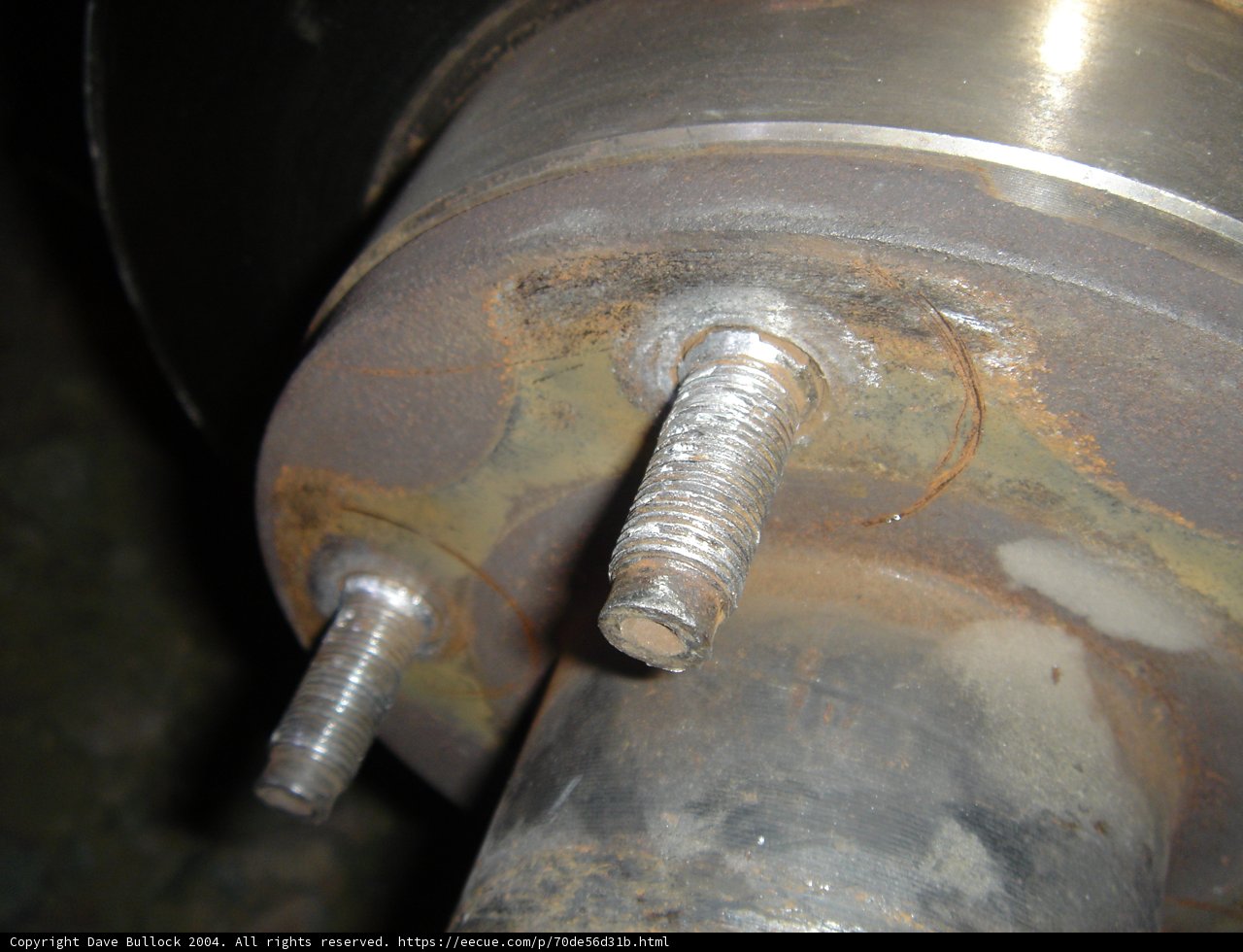 Rusted Brake Rotor with Bolt and Two Screws