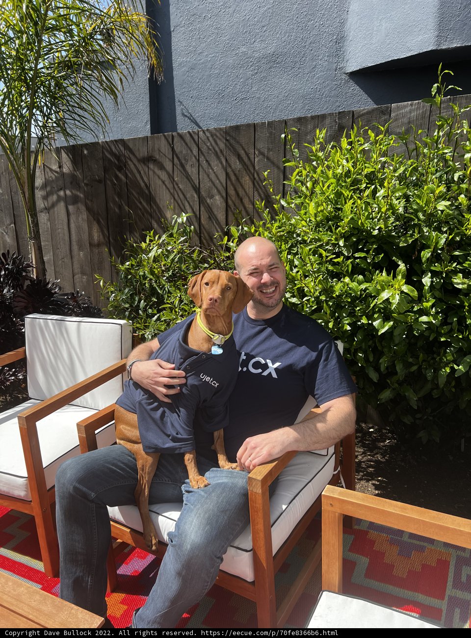 Man and Dog in Backyard