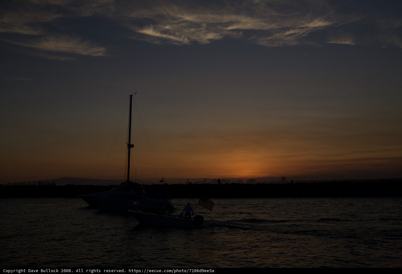 Serene sailboats at sunset