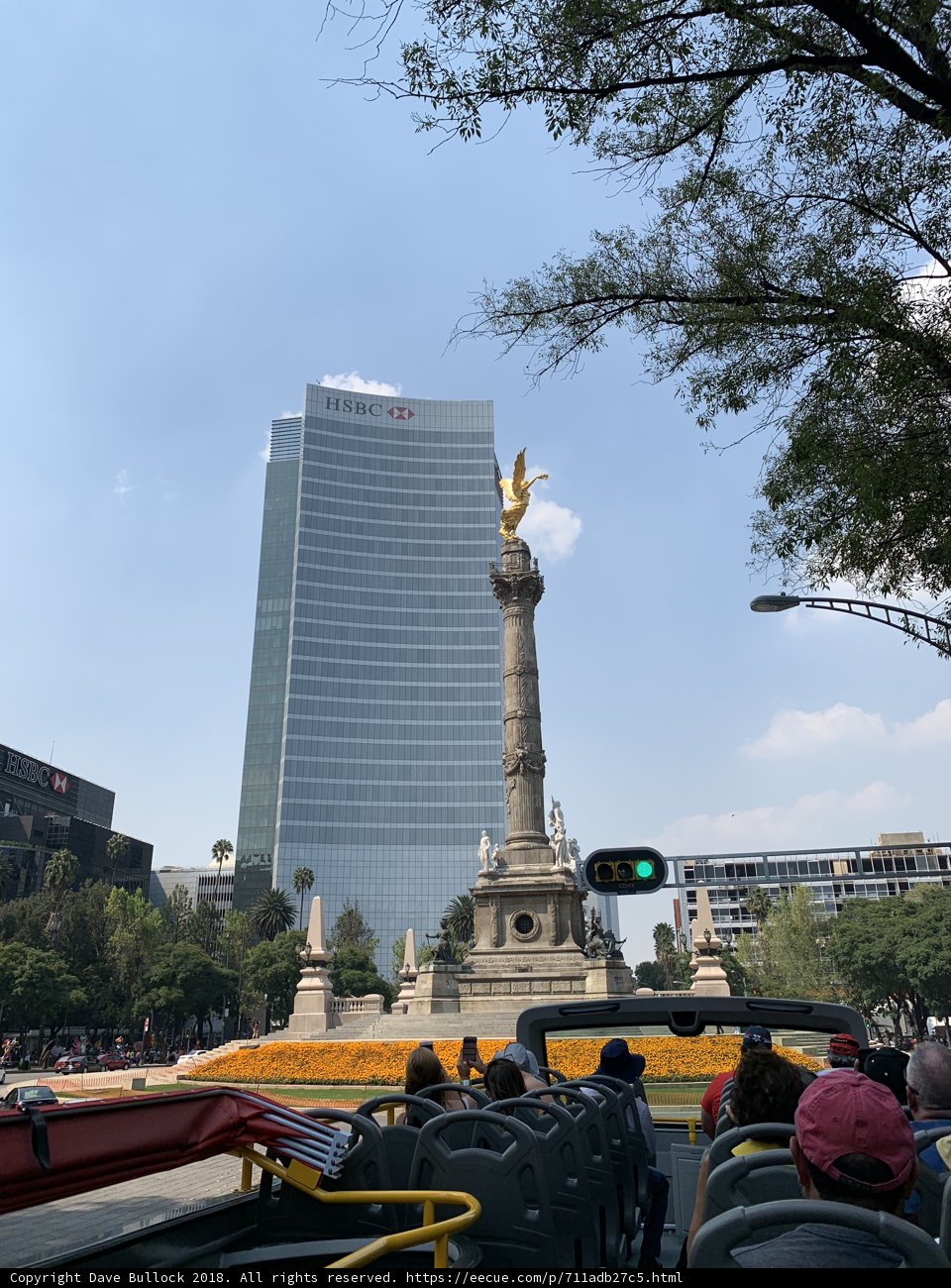 Majestic King Statue overlooking Urban Metropolis