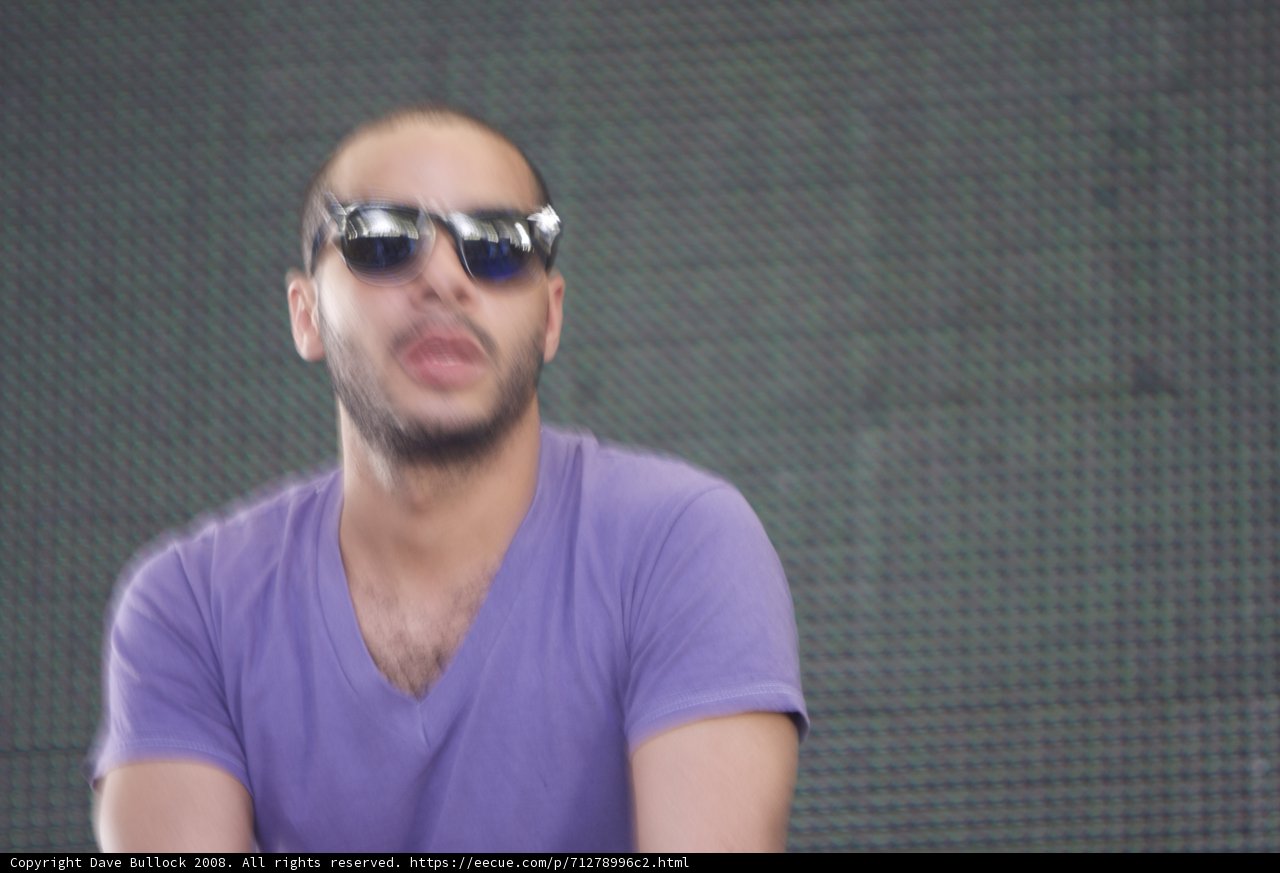 DJ Mehdi in Sunglasses and a Purple T-Shirt