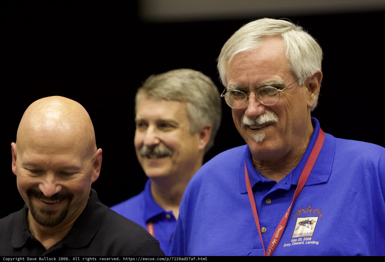 Three Happy Men in Blue Shirts and Mustaches