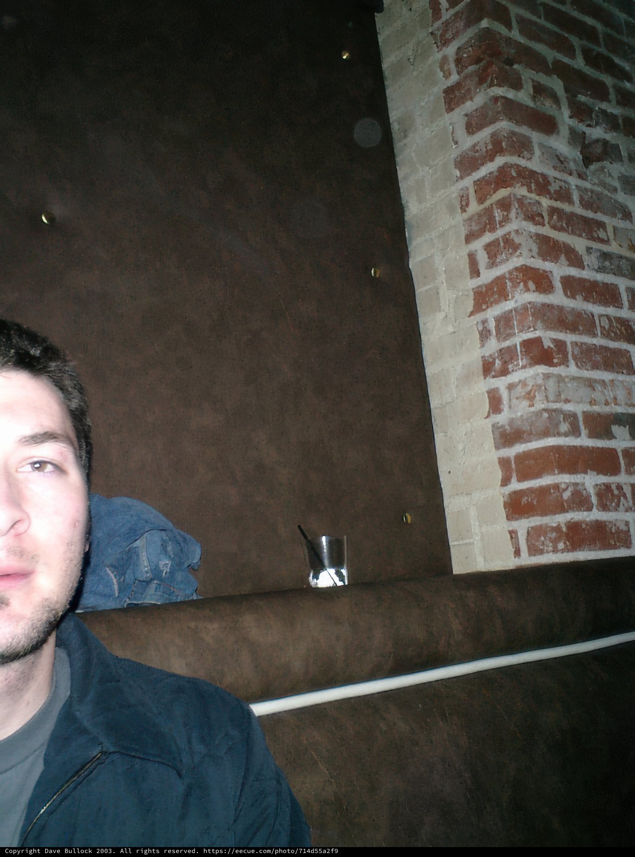 Man on the Brick Wall Couch