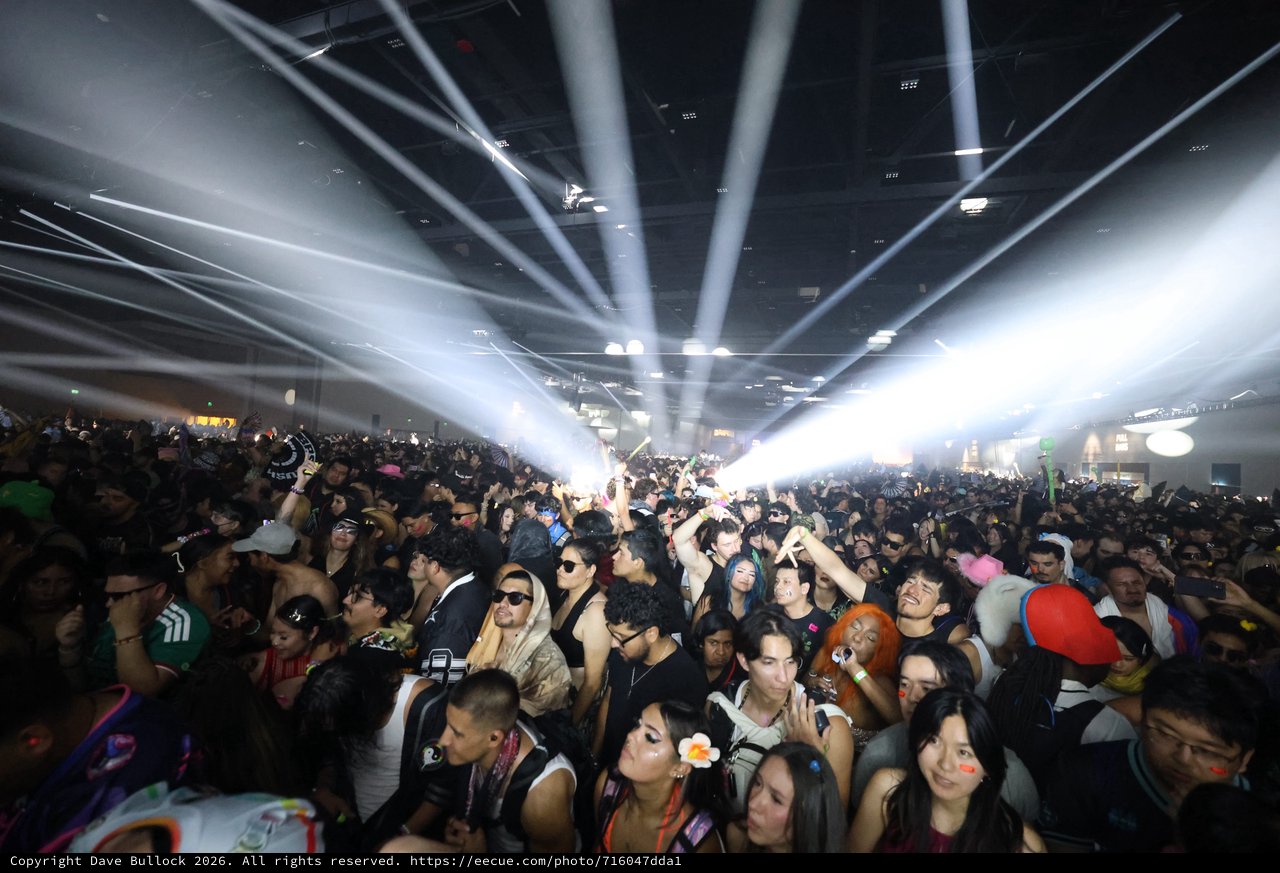 Massive EDM Crowd Bathed in Laser Light Show