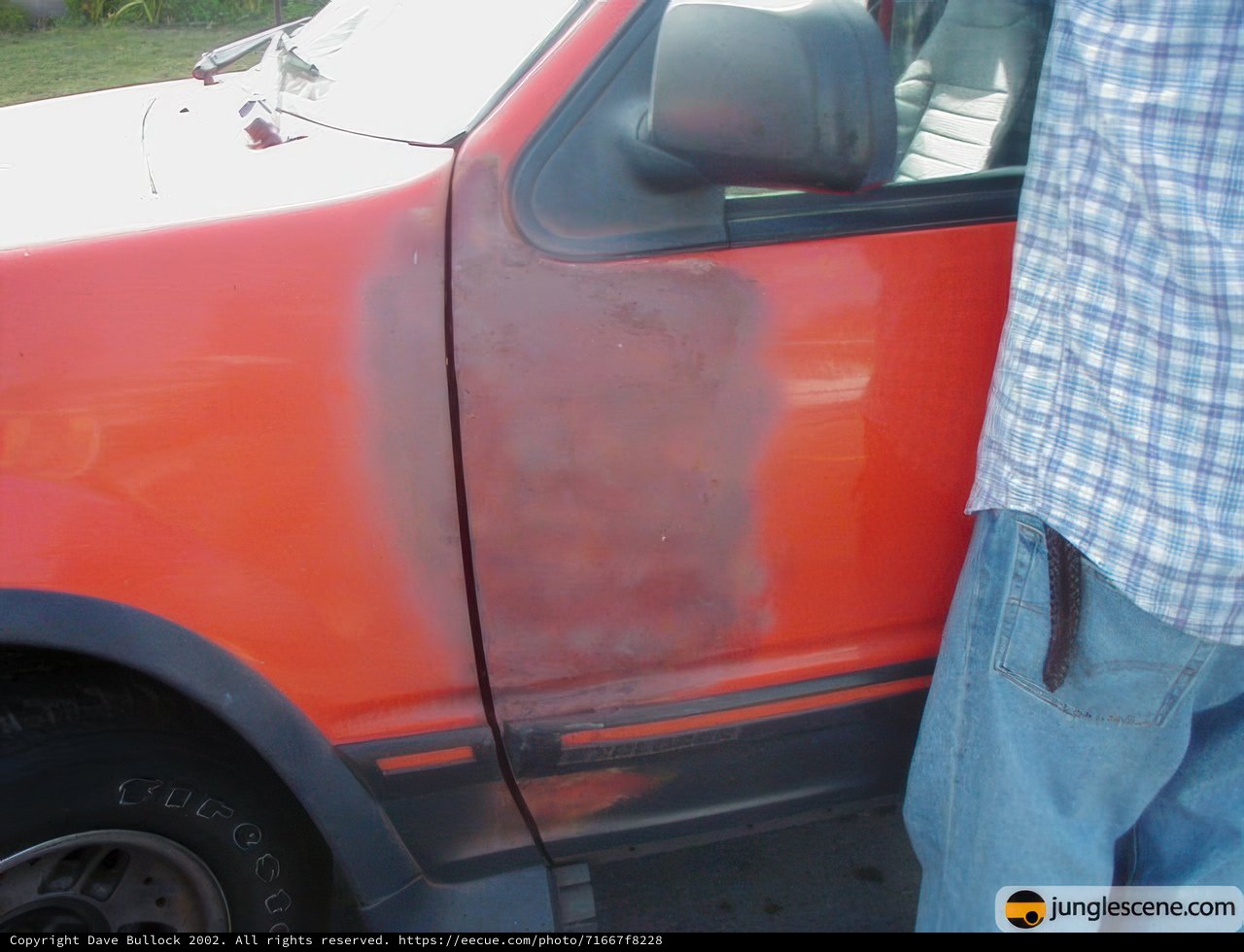 Red Car with Black Stripe