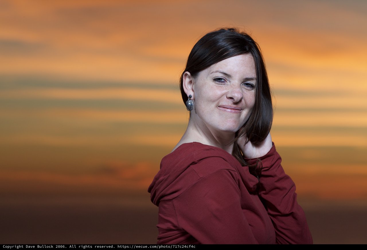 Penelope Smiles Against a Fiery Sunset Sky