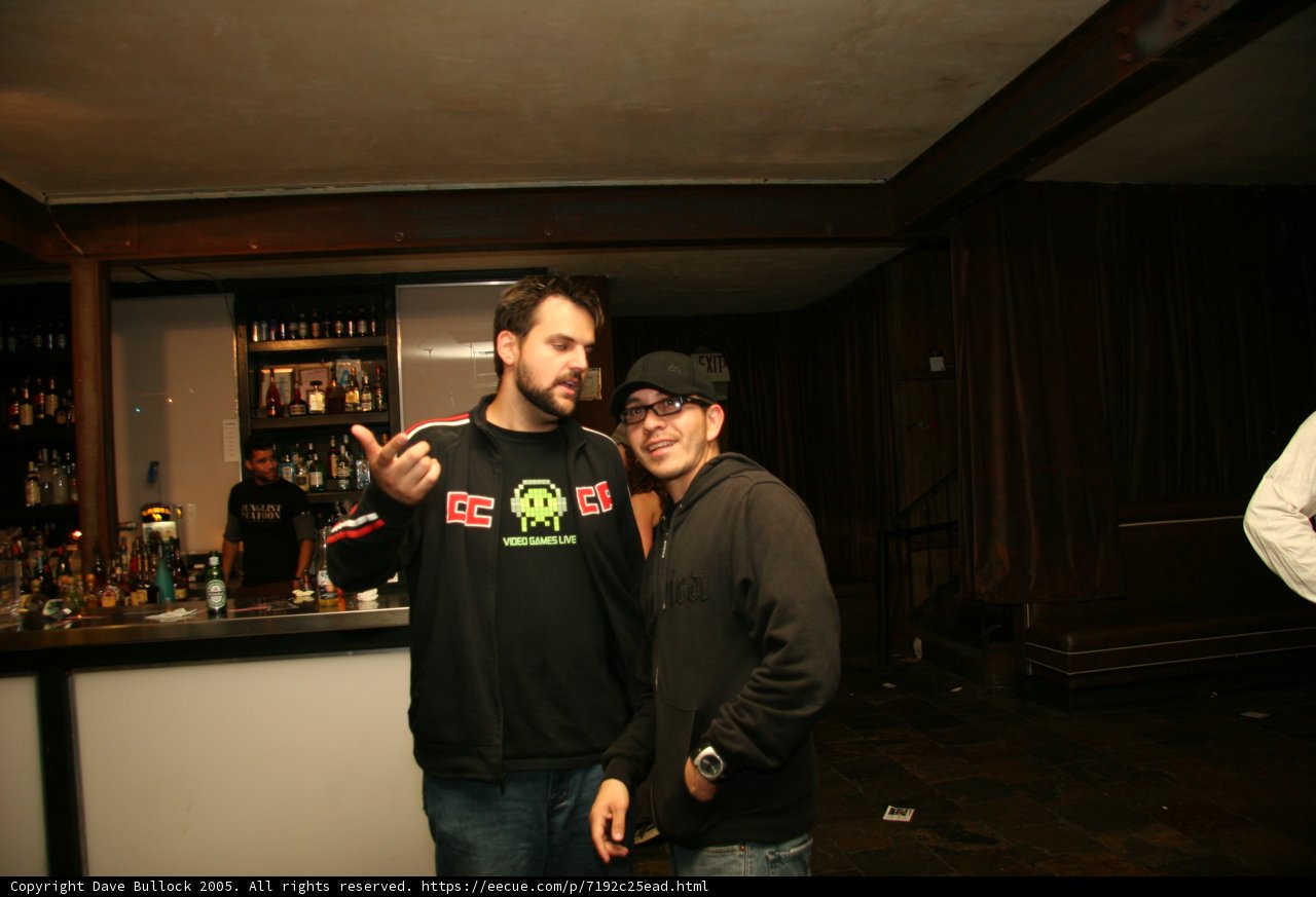Two Men Enjoying a Drink at the Bar