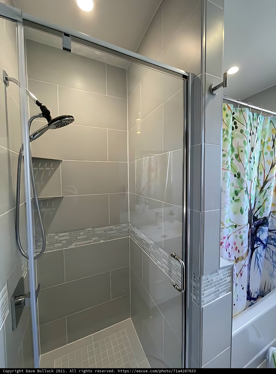 Sleek and Modern Bathroom with Two Showers