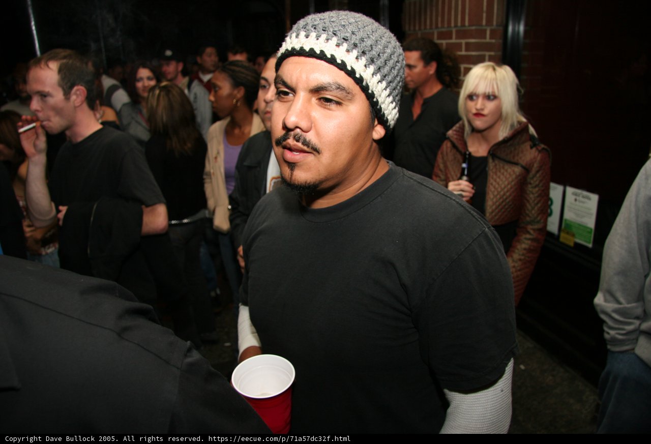 Black Shirt, Beanie and a Crowd