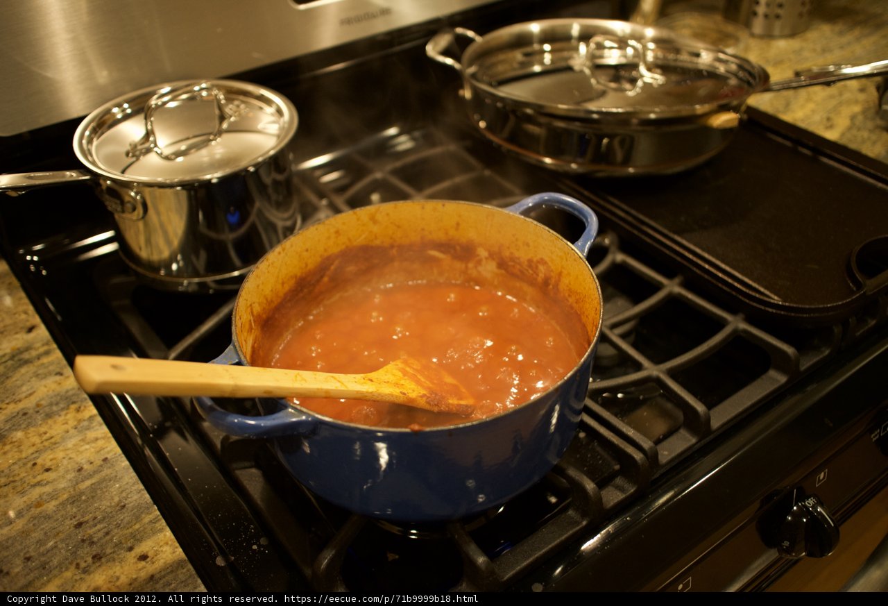 Homemade Tomato Sauce simmering on the Stove