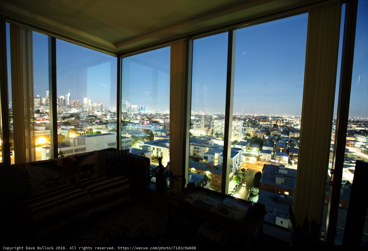 Cityscape View from a Cozy Living Room