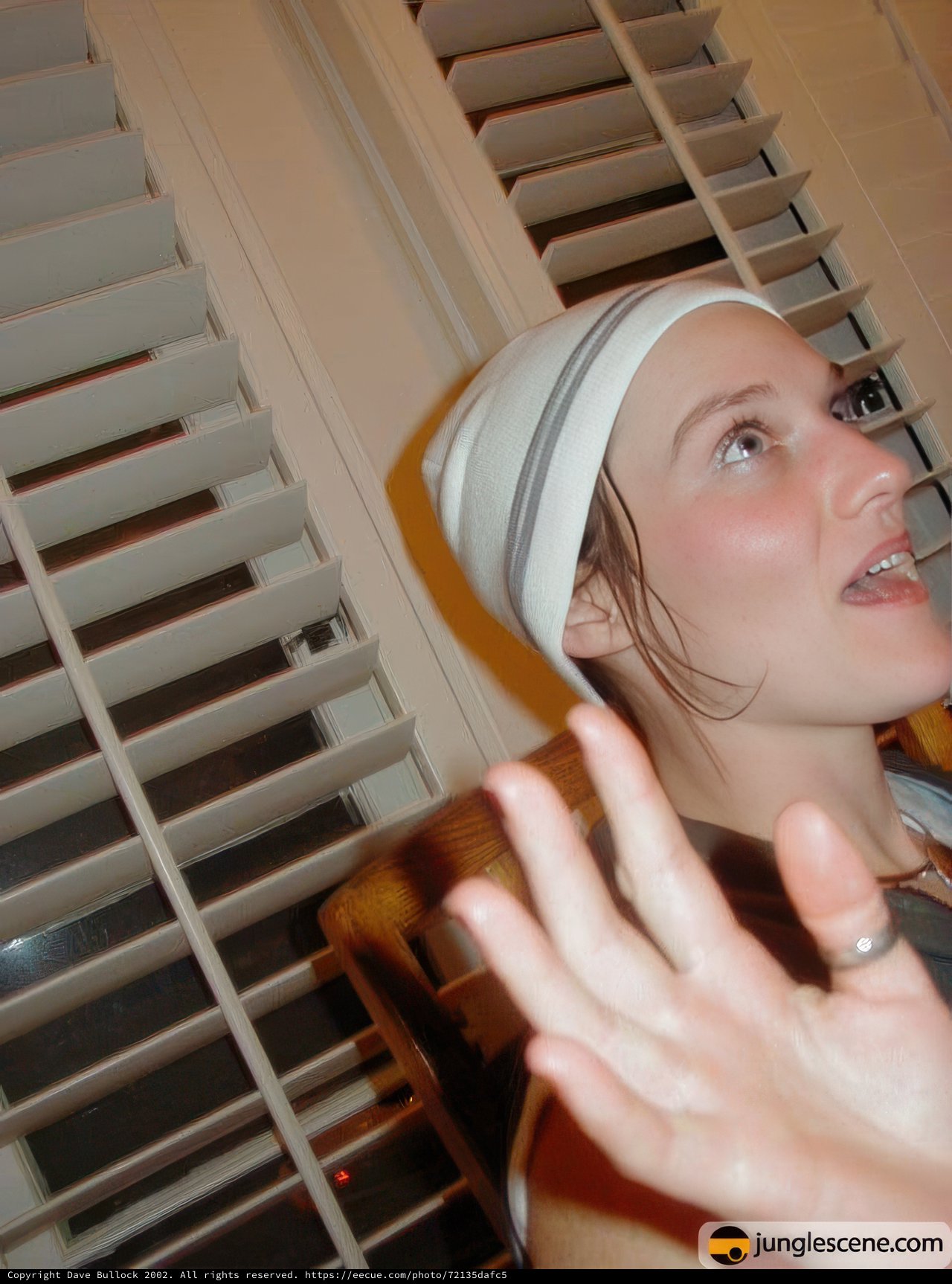 A Captivating Portrait of a Woman in a White Hat