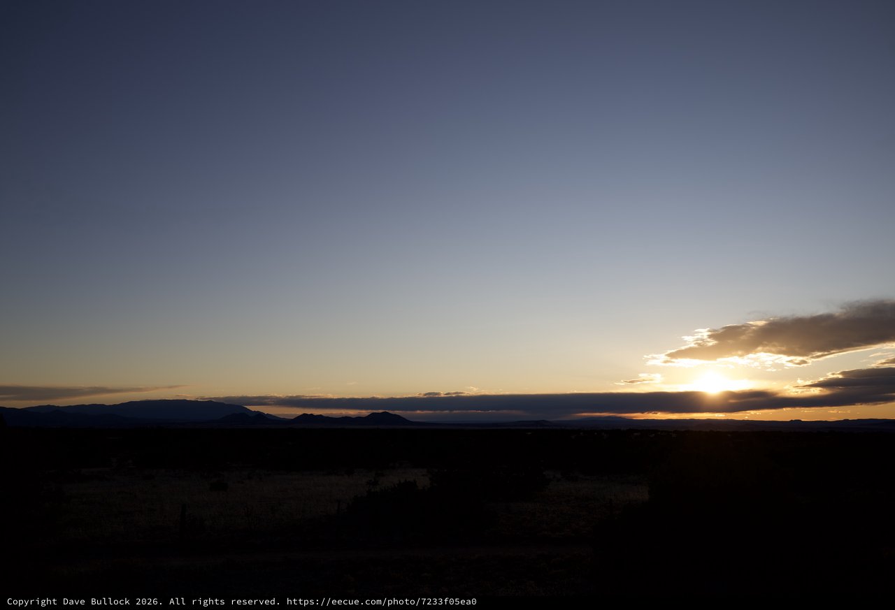 Sunset Over Desert Mountains and Scrubland