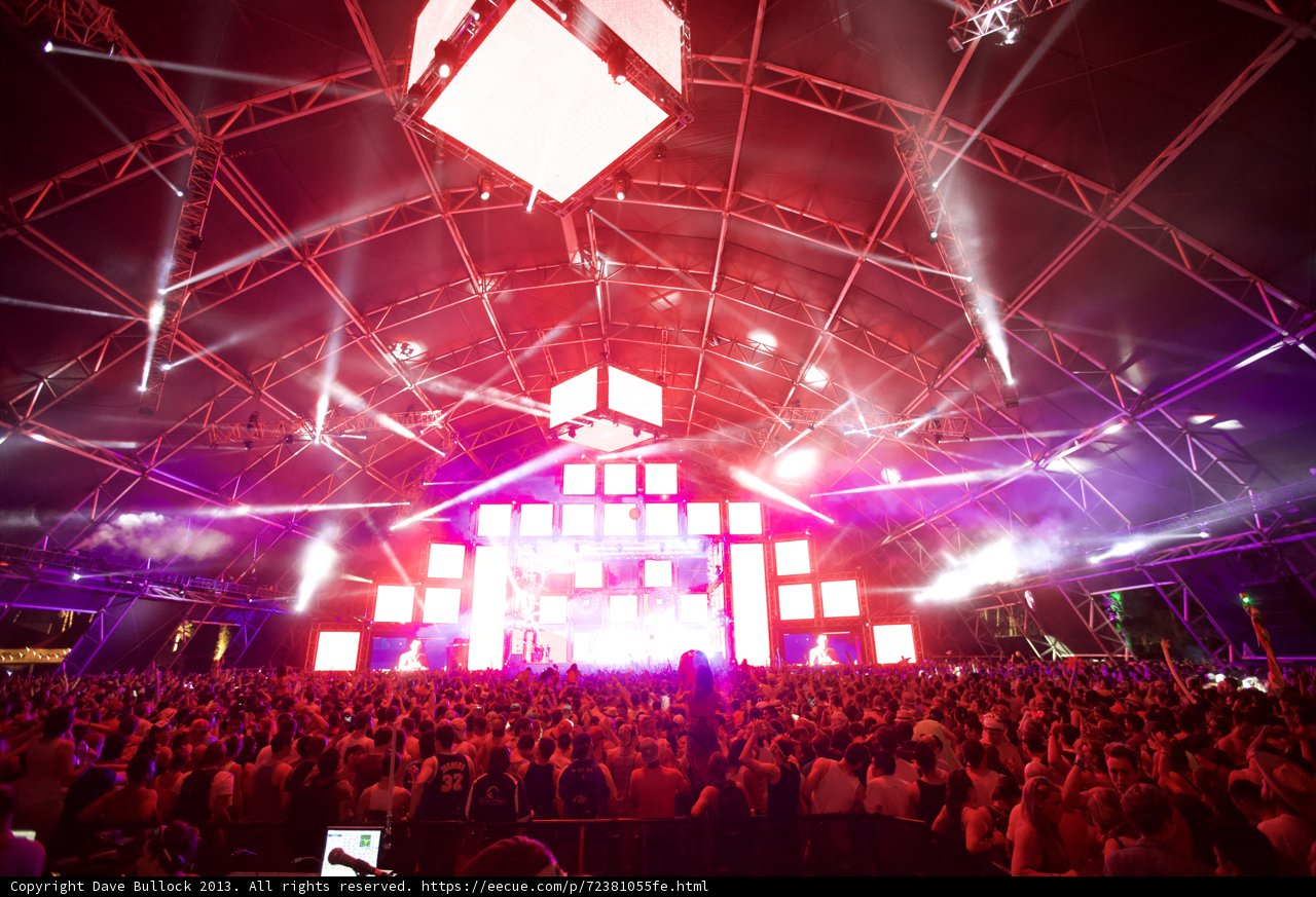 Coachella Crowd Under Neon Sky