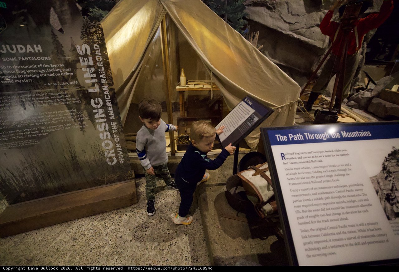 Children Exploring Railroad History Museum Exhibit