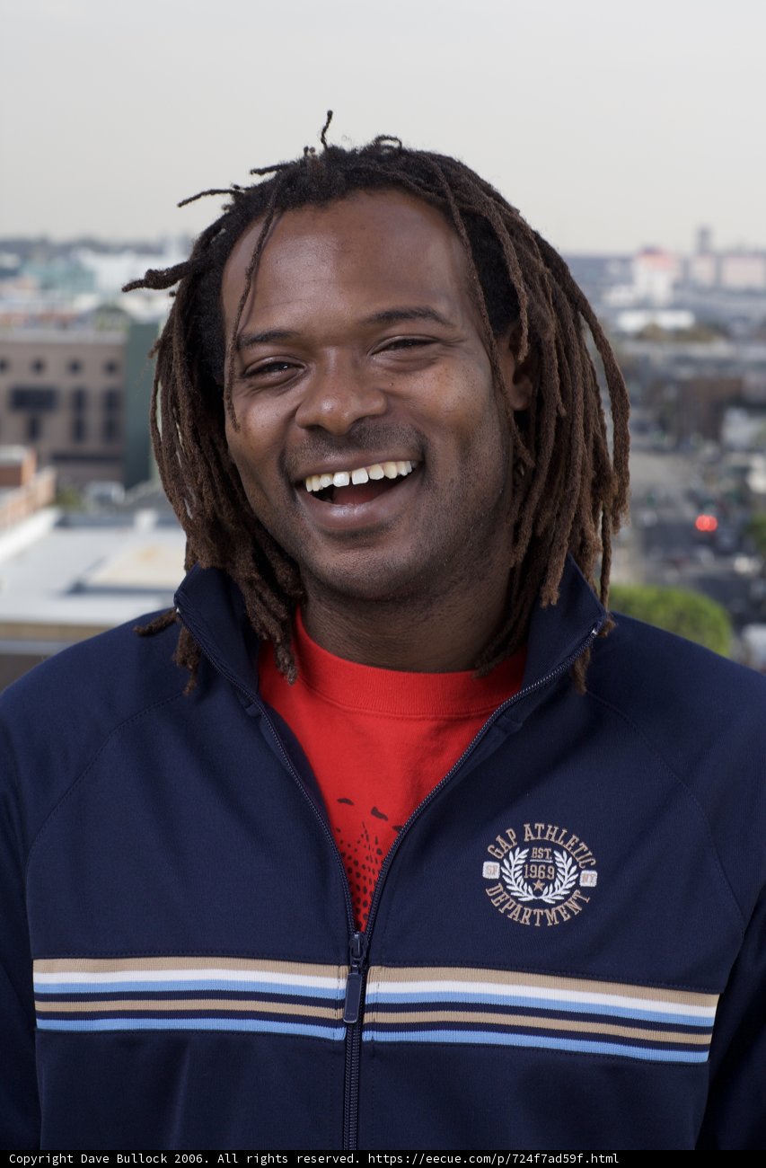 Smiling Man with Dreadlocks
