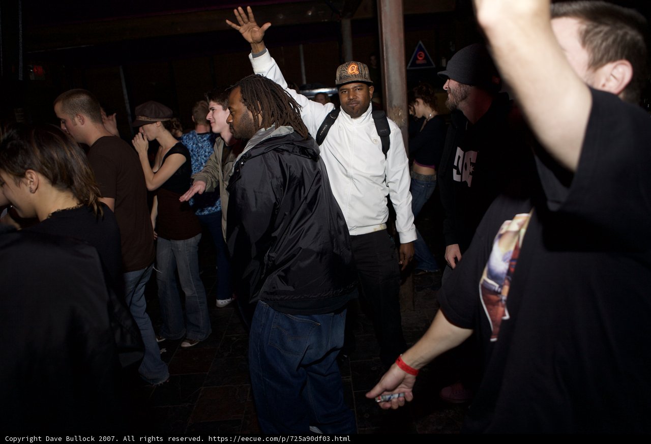 Black-Shirted Steve J in Urban Crowd