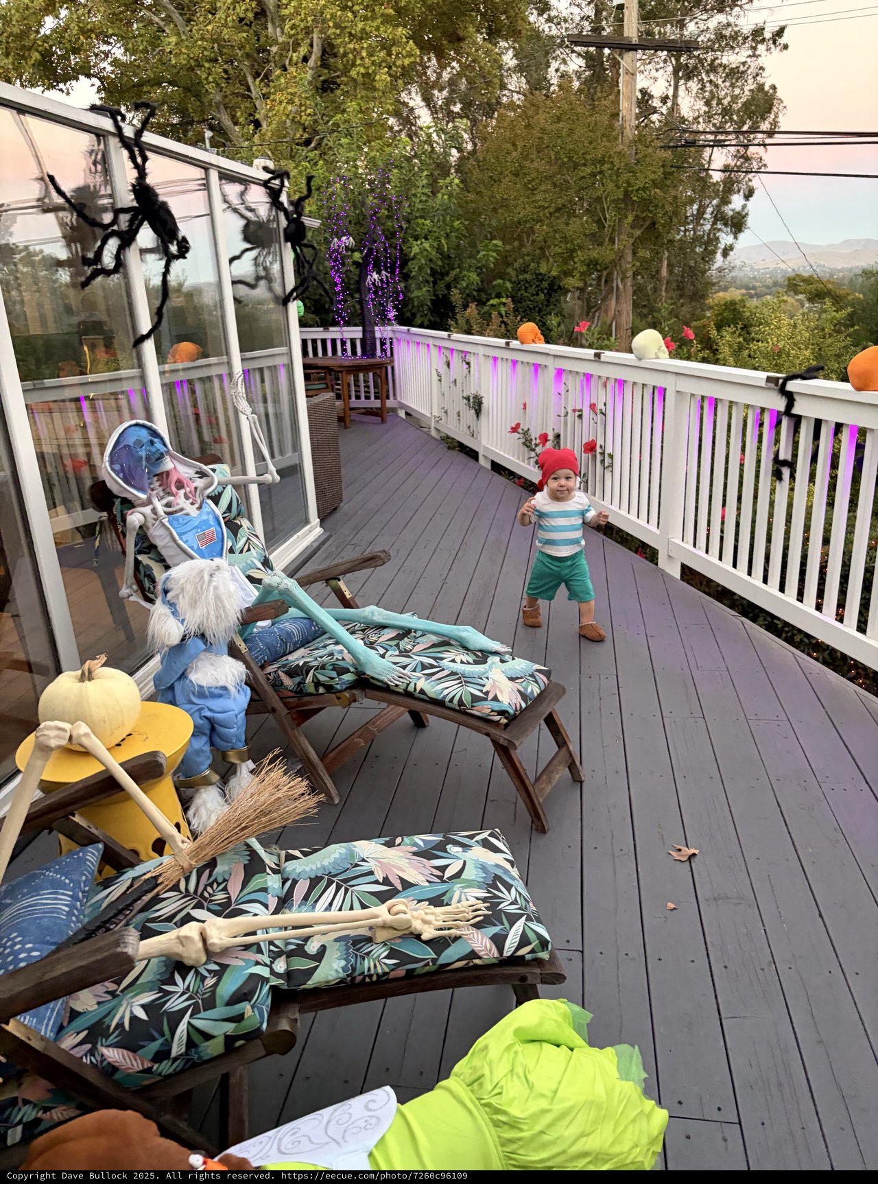 Halloween Decorated Deck with Toddler in Fog
